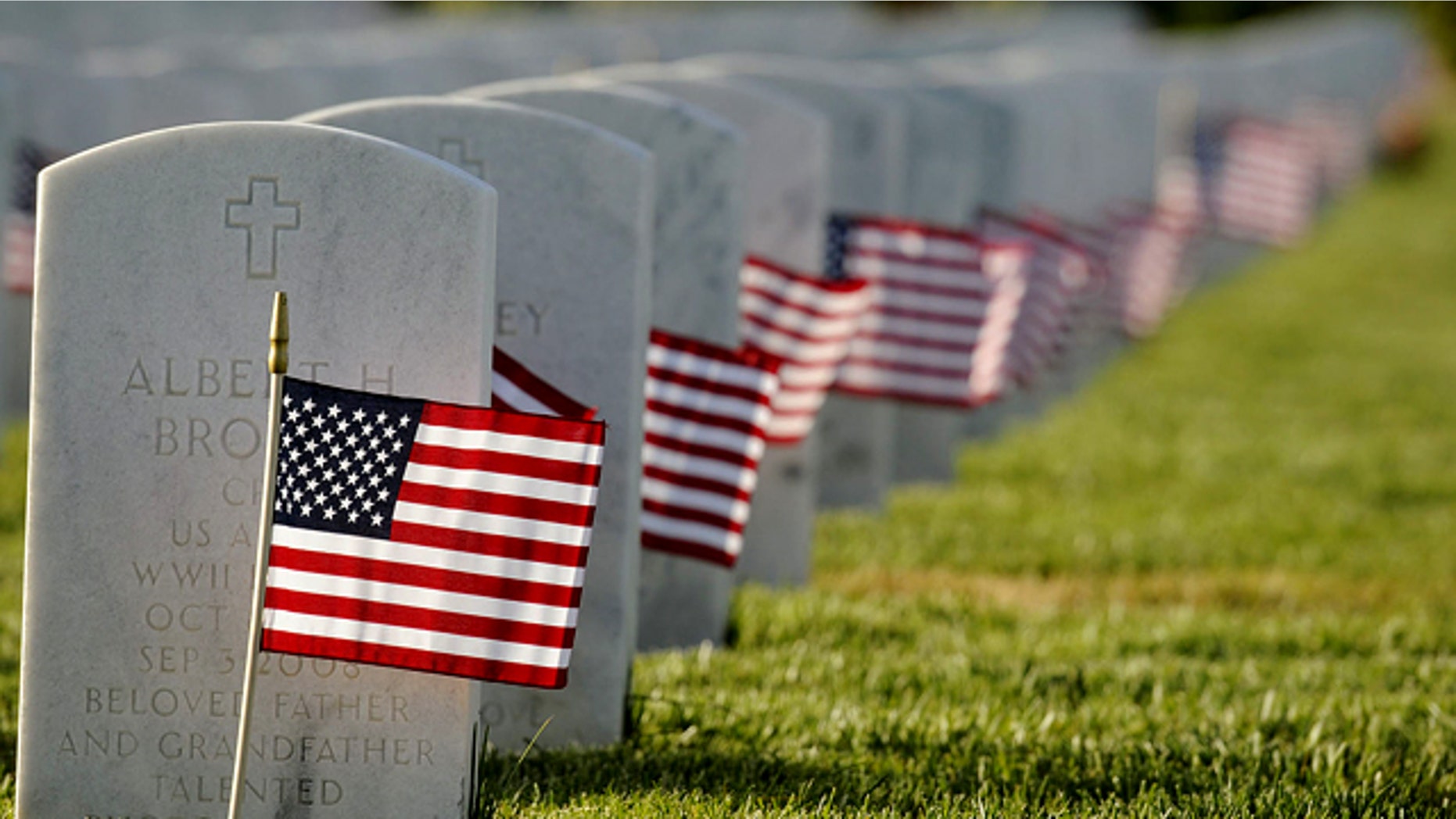 Members of several service organizations including Boy Scouts, Girl Scouts, 4-H and private citizens fanned out across the 561-acre Sacramento Valley National Cemetery in Dixon, Calif. to make sure every one of the grave nearly six thousand armed service members buried received a flag the on Thursday, May 27, 2010 in preparation for Monday's Memorial Day Service at the VA Cemetery.(AP Photo/The Reporter, Joel Rosenbaum) MANDATORY CREDIT; MAGS OUT; NO SALES