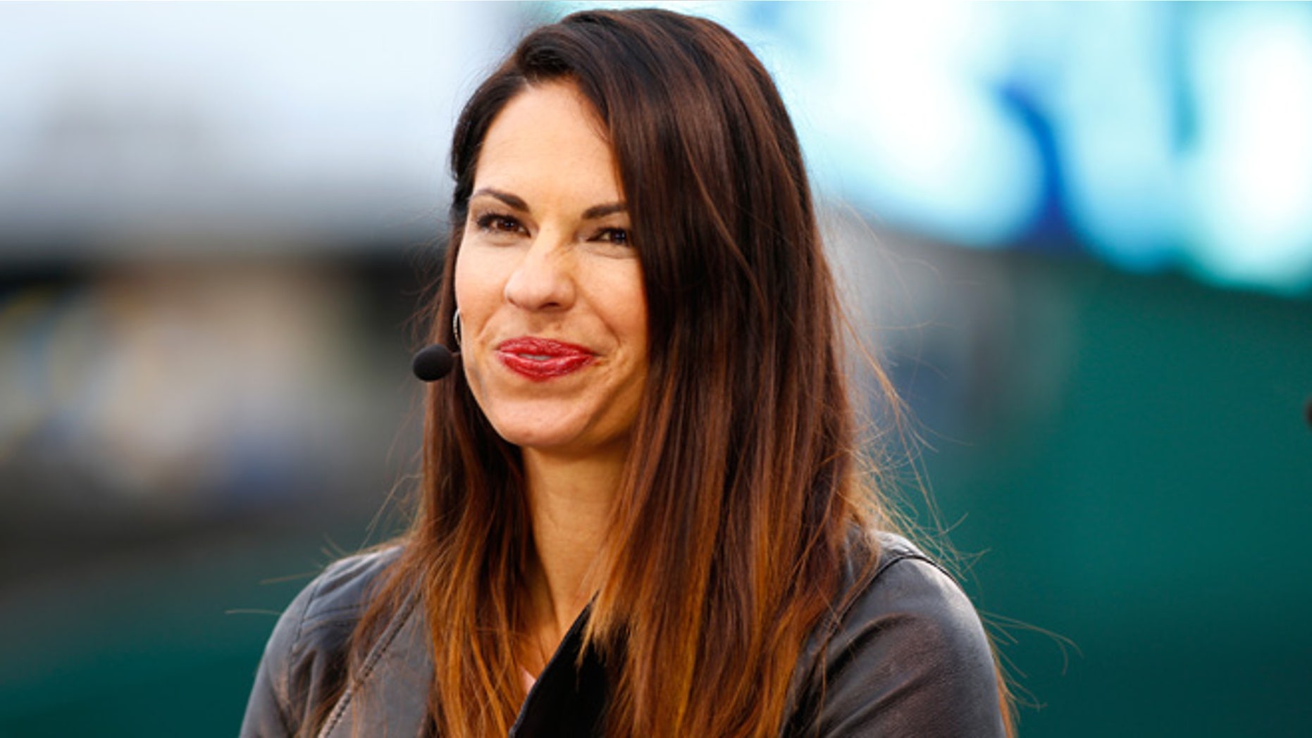 Jessica Mendoza of ESPN speaks on set the day before Game 1 of the 2015 World Series between the Royals and Mets at Kauffman Stadium on October 26, 2015 in Kansas City, Missouri.