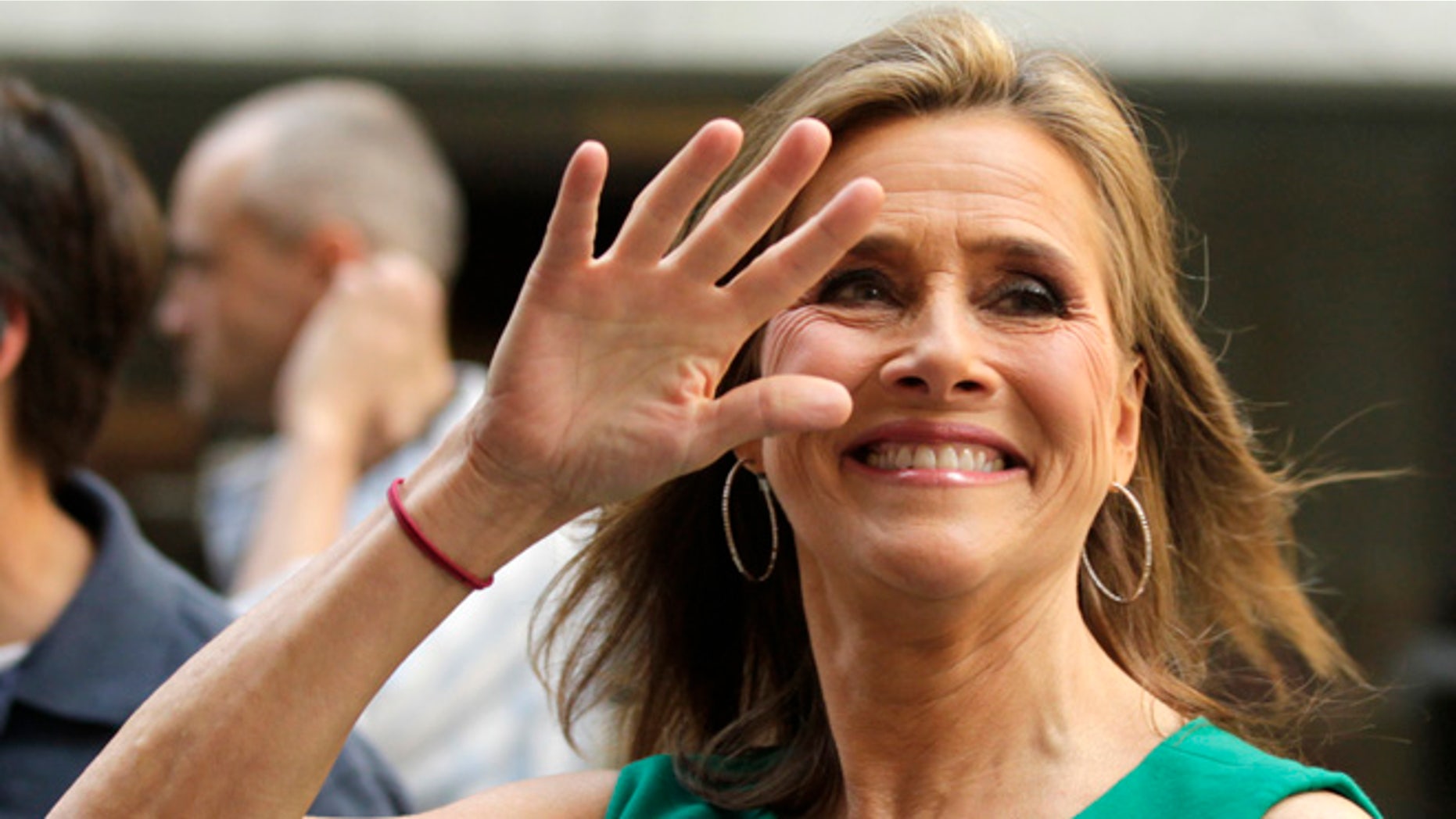 June 8, 2011. Meredith Vieira waves to fans during her final "Today" show in New York, June 8, 2011.