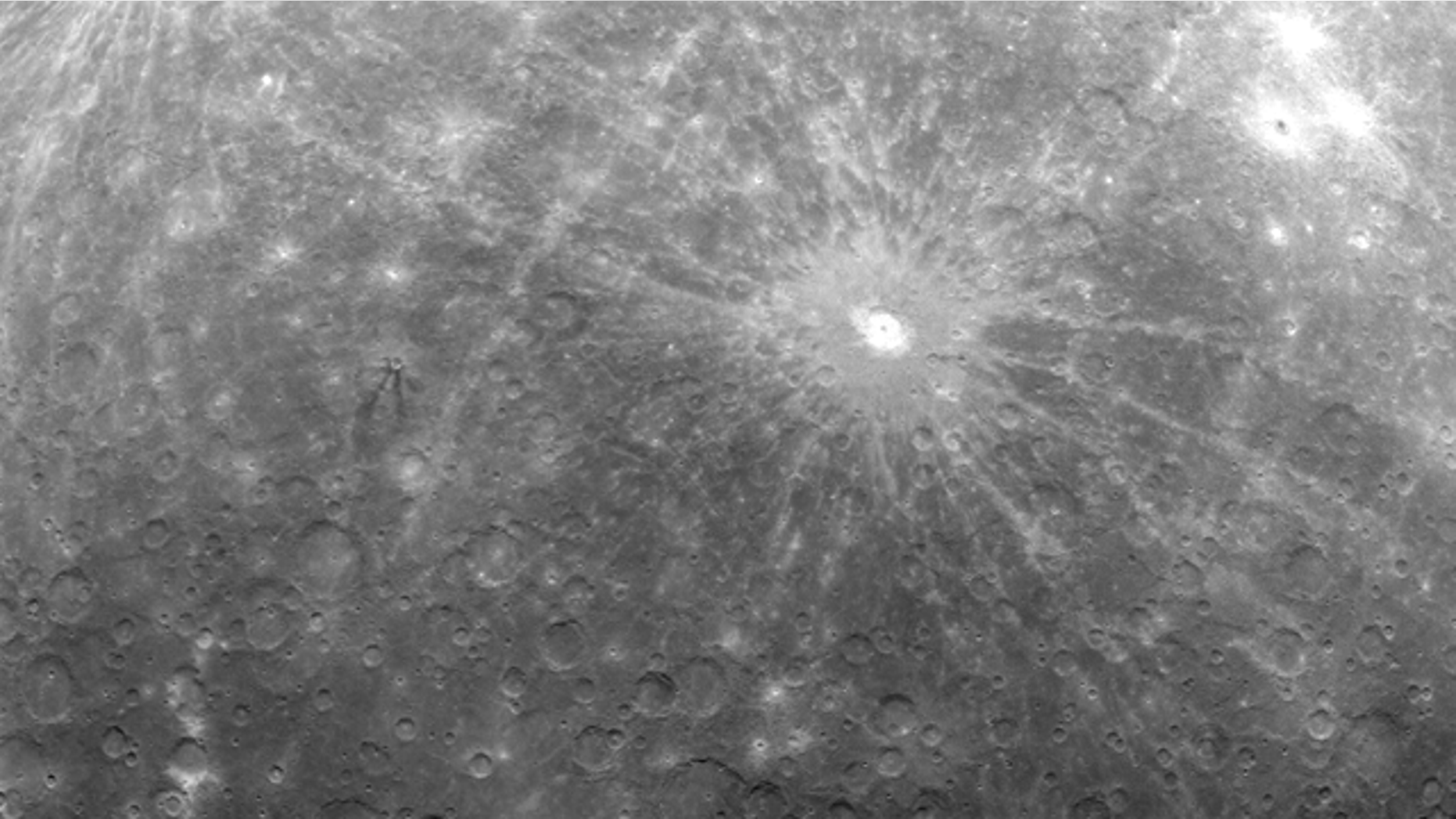 NASA's Messenger spacecraft has released its first image of Mercury -- the first ever glimpse of the innermost planet's dusty craters taken by a craft in orbit a mere 124 miles from the planet.