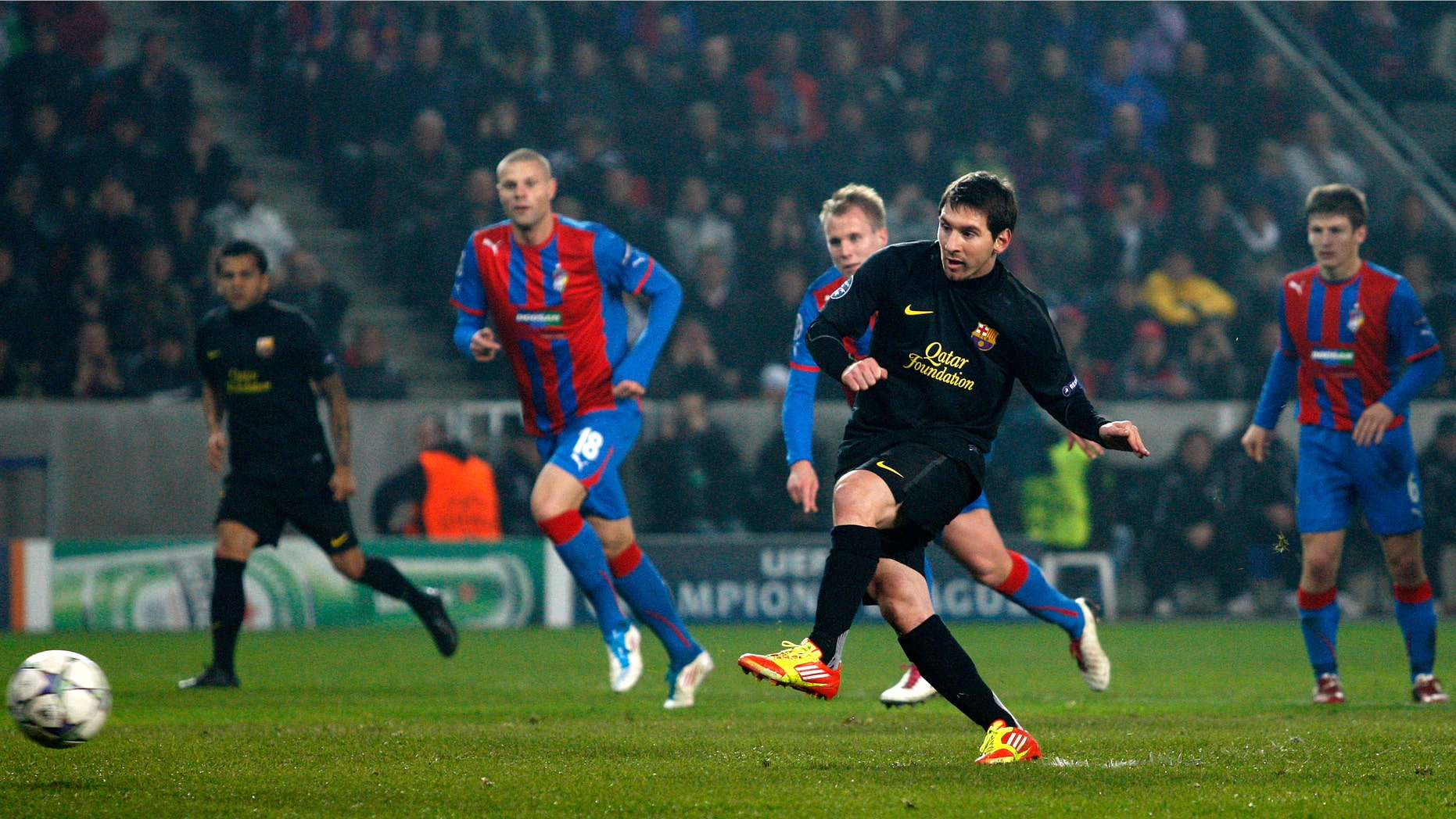 Barcelona's Lionel Messi scores from a penalty shot against Viktoria Pilsen during their Champions League Group H soccer match in Prague, Czech Republic, Tuesday, Nov. 1, 2011. (AP Photo/Petr David Josek)