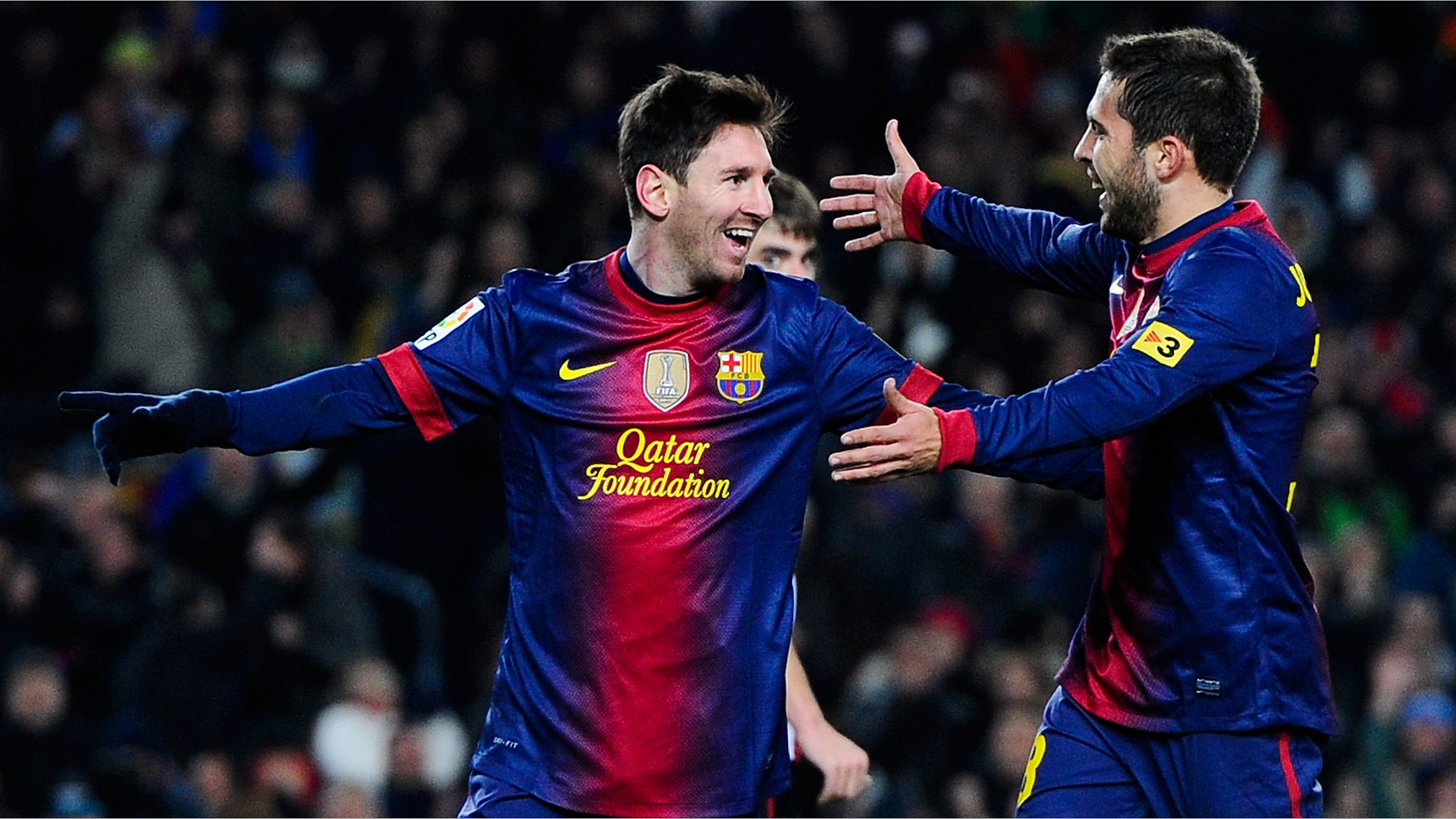 BARCELONA, SPAIN - DECEMBER 01: Lionel Messi of FC Barcelona celebrates with his teammate Jordi Alba after scoring his team's fifth goal during the La Liga match between FC Barcelona and Athletic Club at Camp Nou on December 1, 2012 in Barcelona, Spain. (Photo by David Ramos/Getty Images)