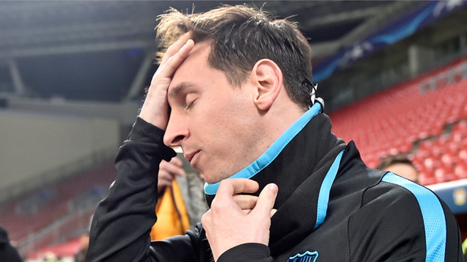 FILE - In this Dec. 8, 2015 file photo, Barcelona's Lionel Messi arrives for a training session at the BayArena in Leverkusen, Germany. Spanish court officials say Lionel Messi's tax fraud trial has been set for May 31-June 3 2016. Messi and his father, Jorge Horacio Messi, have been charged with three counts of tax fraud and could be sentenced to nearly two years in prison if found guilty. They are accused of defrauding Spain's tax office of 4.1 million euros ($4.4 million) in unpaid taxes from 2007-09. (AP Photo/Martin Meissner, File)