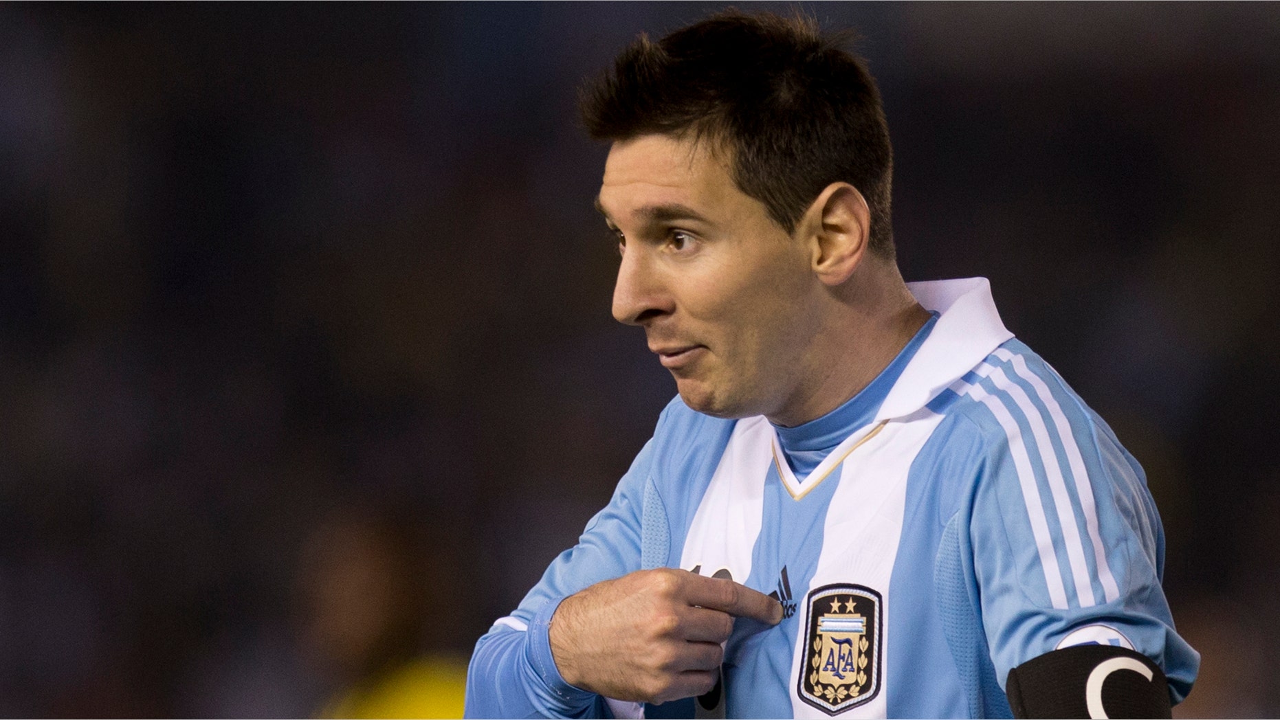 In this picture taken June 7, 2013 FC Barcelona's Lionel Messi, playing for Argentina, gestures to the referee after a goal by Sergio Aguero was disallowed due to an off-side of Messi during a 2014 World Cup qualifying soccer match against Colombia in Buenos Aires, Argentina. Barcelona's current and former presidents set aside their differences and defended Lionel Messi against allegations of tax fraud on Thursday, a case that experts say could carry a prison sentence for the Argentina star. A Spanish state prosecutor filed a fraud complaint on Wednesday alleging that Messi and his father Jorge avoided paying 4 million euros ($5.3 million) in back taxes on earnings from image rights during 2006-2009 by using illegal overseas tax havens.(AP Photo/Eduardo Di Baia)