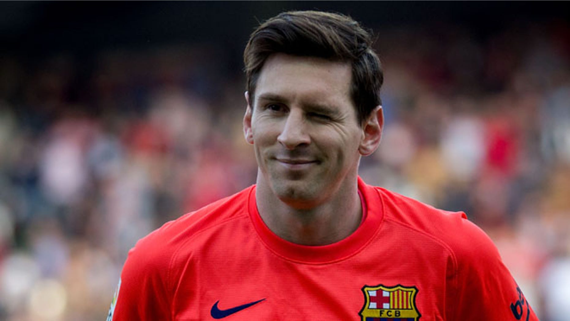 SEVILLE, SPAIN - APRIL 11: Lionel Messi of FC Barcelona wrinkres his eye prior to start the La Liga match between Sevilla FC and FC Barcelona at Estadio Ramon Sanchez Pizjuan on April 11, 2015 in Seville, Spain. (Photo by Gonzalo Arroyo Moreno/Getty Images)