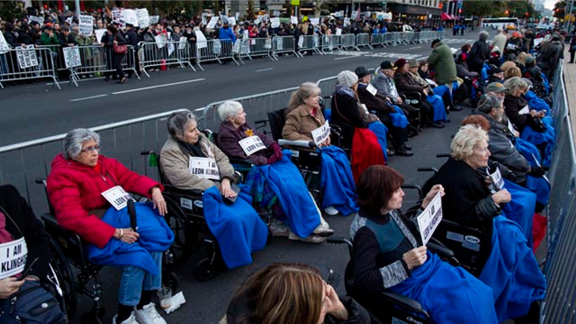 October 20, 2014: A long line of people in wheelchairs gather at Lincoln Center as they protest 'Death of Klinghoffer' in New York. (AP Photo/Craig Ruttle)