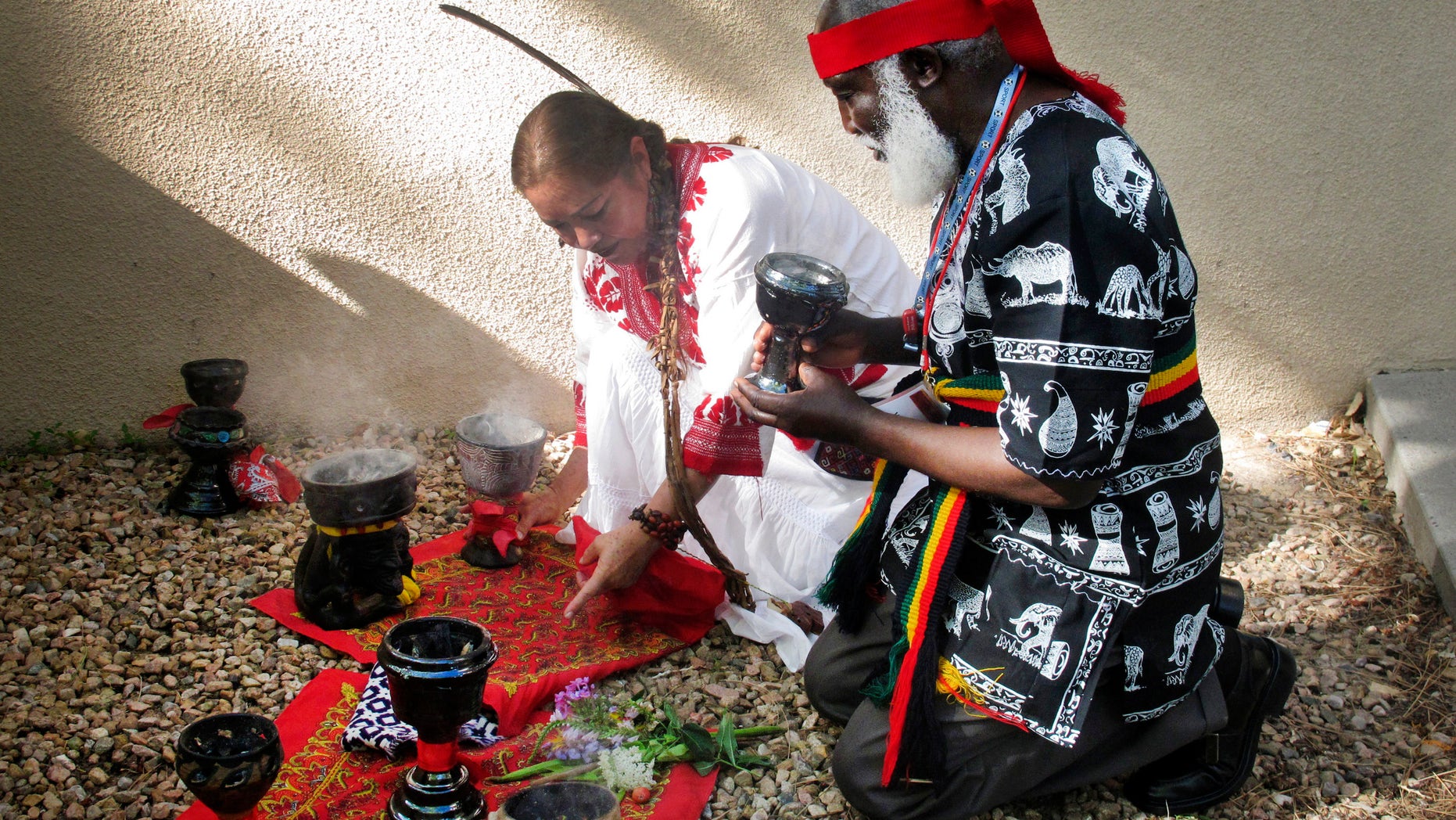 Curanderos, or traditional healers, conducting a ceremony on the campus of the University of New Mexico in Albuquerque.