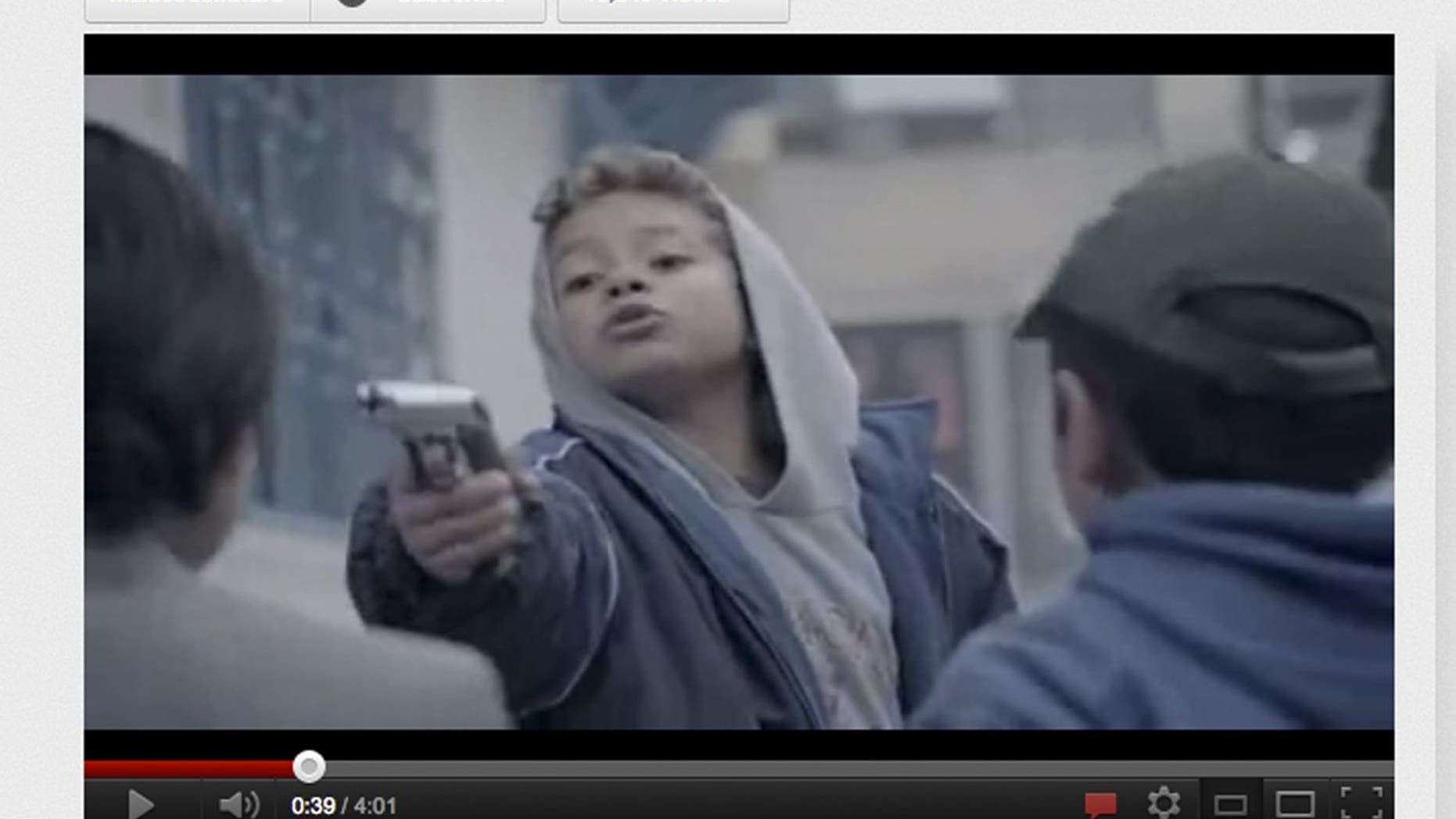 In this still image of a computer screen showing the YouTube website displaying a video mockumentary entitled Ninos Incomodos, roughly Discomforting Kids, that shows children as kidnappers, corrupt cops and drug traffickers, is seen, in Mexico City, Thursday April 12, 2012. Produced by a foundation supported by private companies and universities and distributed over the Internet, the video, which has sparked a fierce debate in violence-torn Mexico, ends with a direct message to the candidates in the Mexicos July 1 presidential race. (AP Photo)