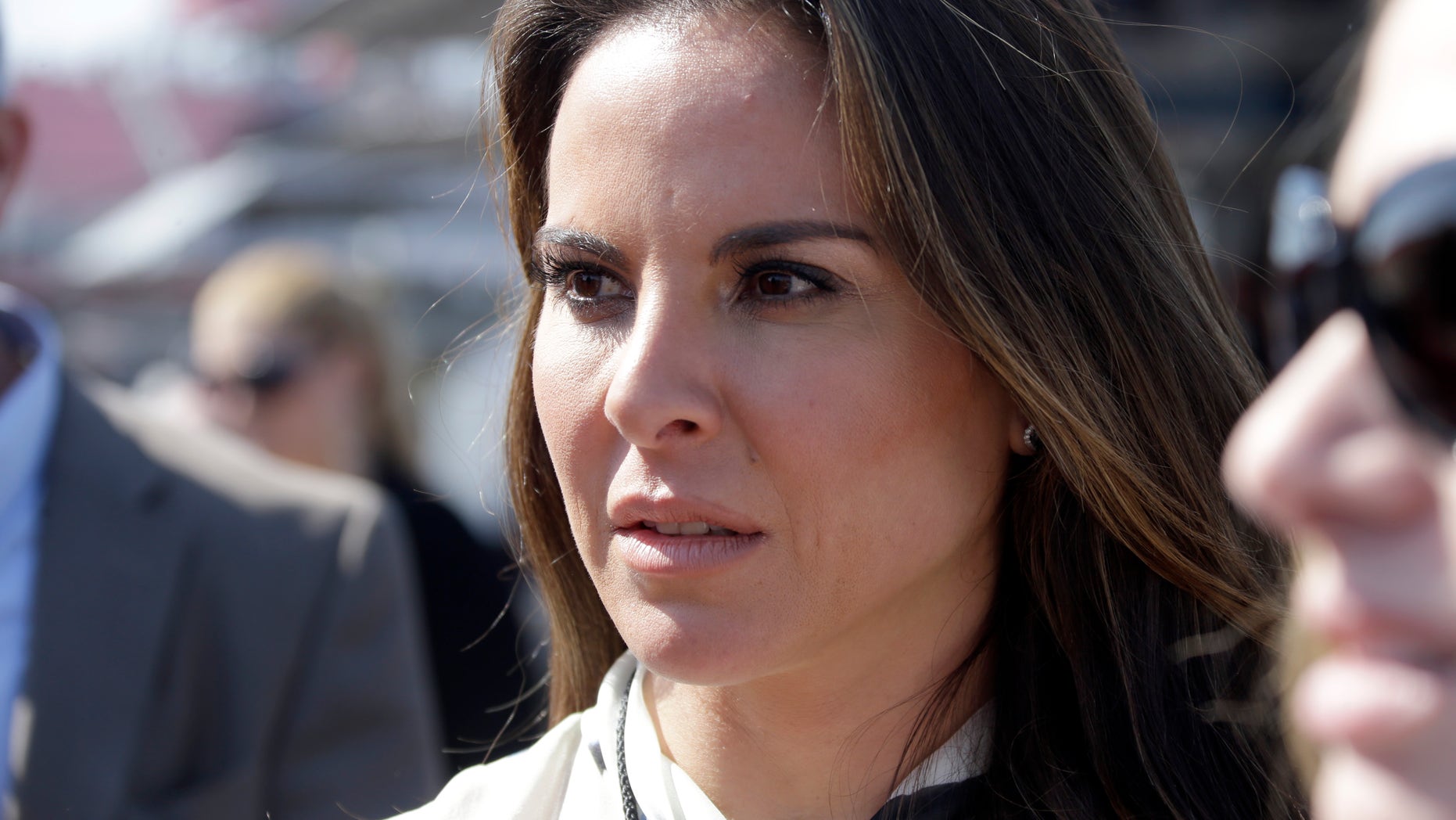FILE - In this March 24, 2013 file photo, Mexican actress Kate Del Castillo attends a NASCAR Sprint Cup auto race in Fontana, Calif. Mexican authorities said on Monday, Jan. 18, 2016, that they want to talk to the Mexican actress who arranged an interview with drug lord Joaquin El Chapo Guzman for actor Sean Penn. (AP Photo/Reed Saxon, File)