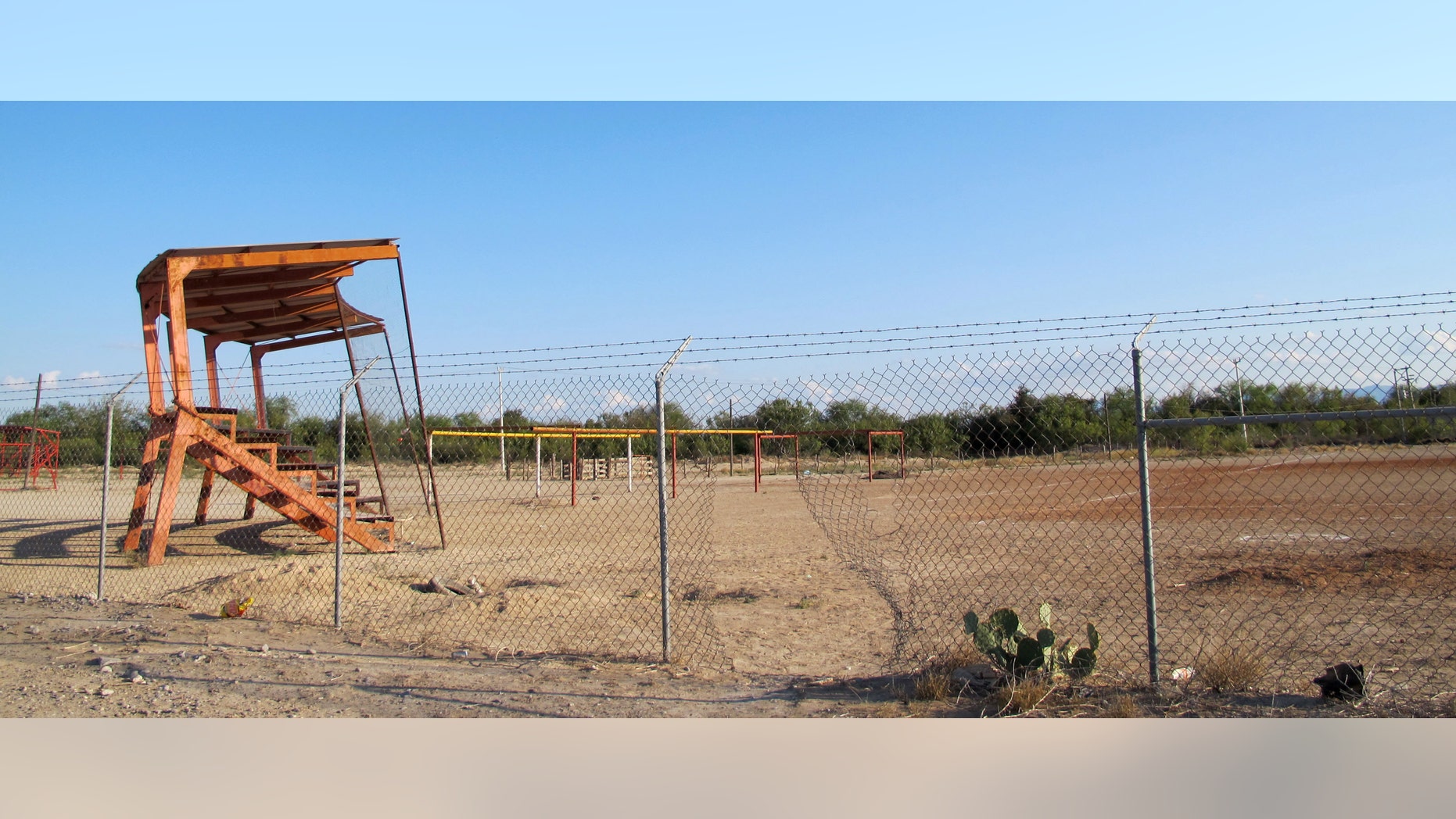 This Oct. 10, 2012 photo shows a ball field, the alleged site where Heriberto Lazcano, a founder and top leader of the Zetas drug cartel, was killed in Mexico's Coahuila state. Despite the crowd, nobody is willing to admit they were there the afternoon of Oct. 7 or saw the shootout just outside the ball field in the heart of Coahuila state, the alleged site where Mexican marines gunned down Lazcano, the biggest kingpin netted so far in Mexico's President Felipe Calderonâs six-year assault on organized crime. (AP Photo/Olga R. Rodriguez)