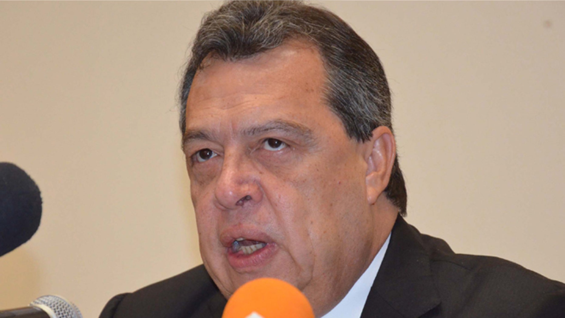 Angel Aguirre, governor of the state of Guerrero announces hes stepping aside during a press conference in Chilpancingo, Mexico, Thursday Oct. 23, 2014. Aguirre said he is putting his duties aside while an investigation continues nearly a month after 43 students disappeared and six people were killed in an attack that has implicated local police and politicians in the city of Iguala. Aguirre had been a target of protesters anger since the incident. (AP Photo/Alejandrino Gonzalez)