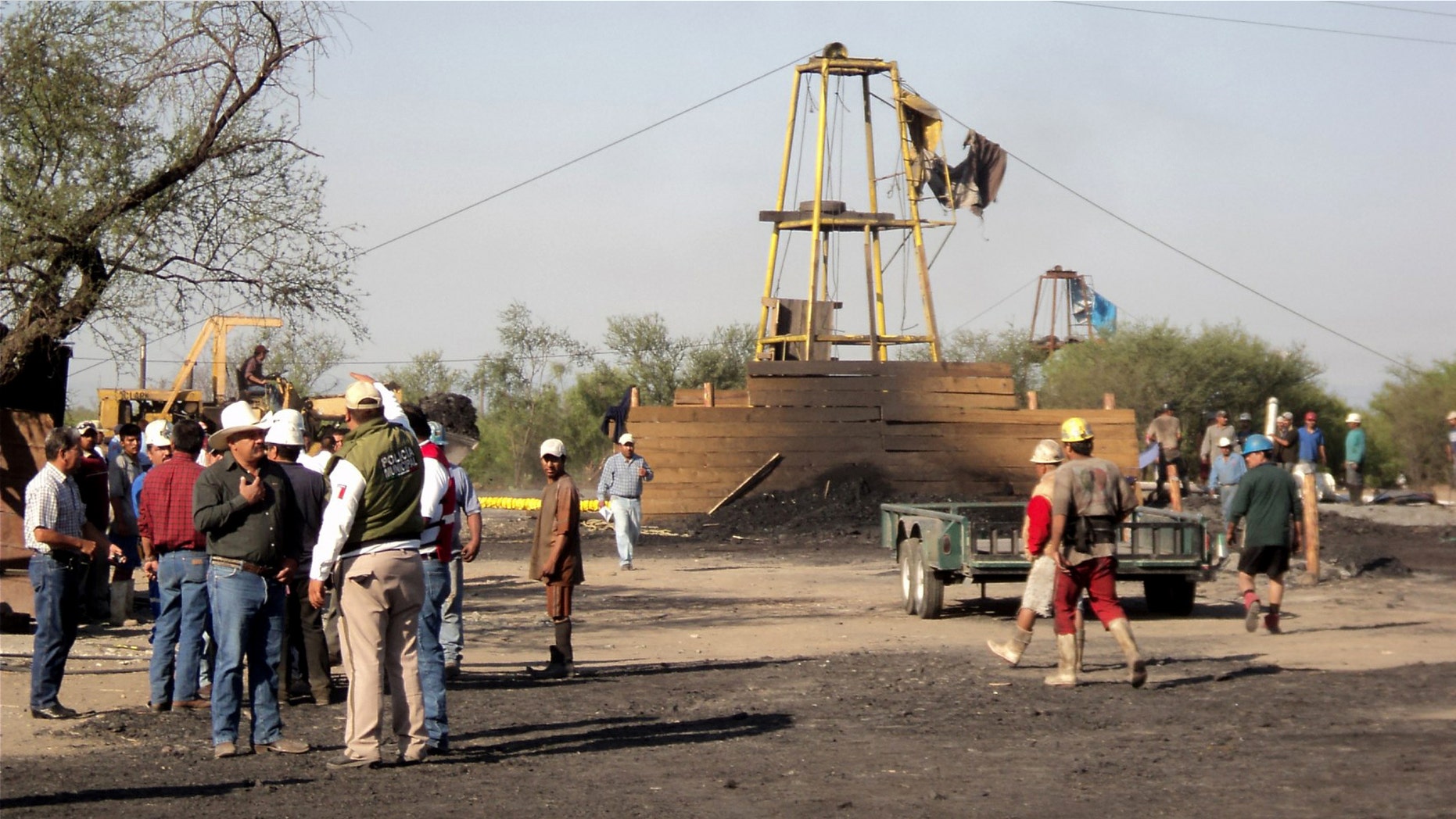 May 3: People wait outside a coal mine in San Juan de Sabinas, in the Mexican state of Coahuila.