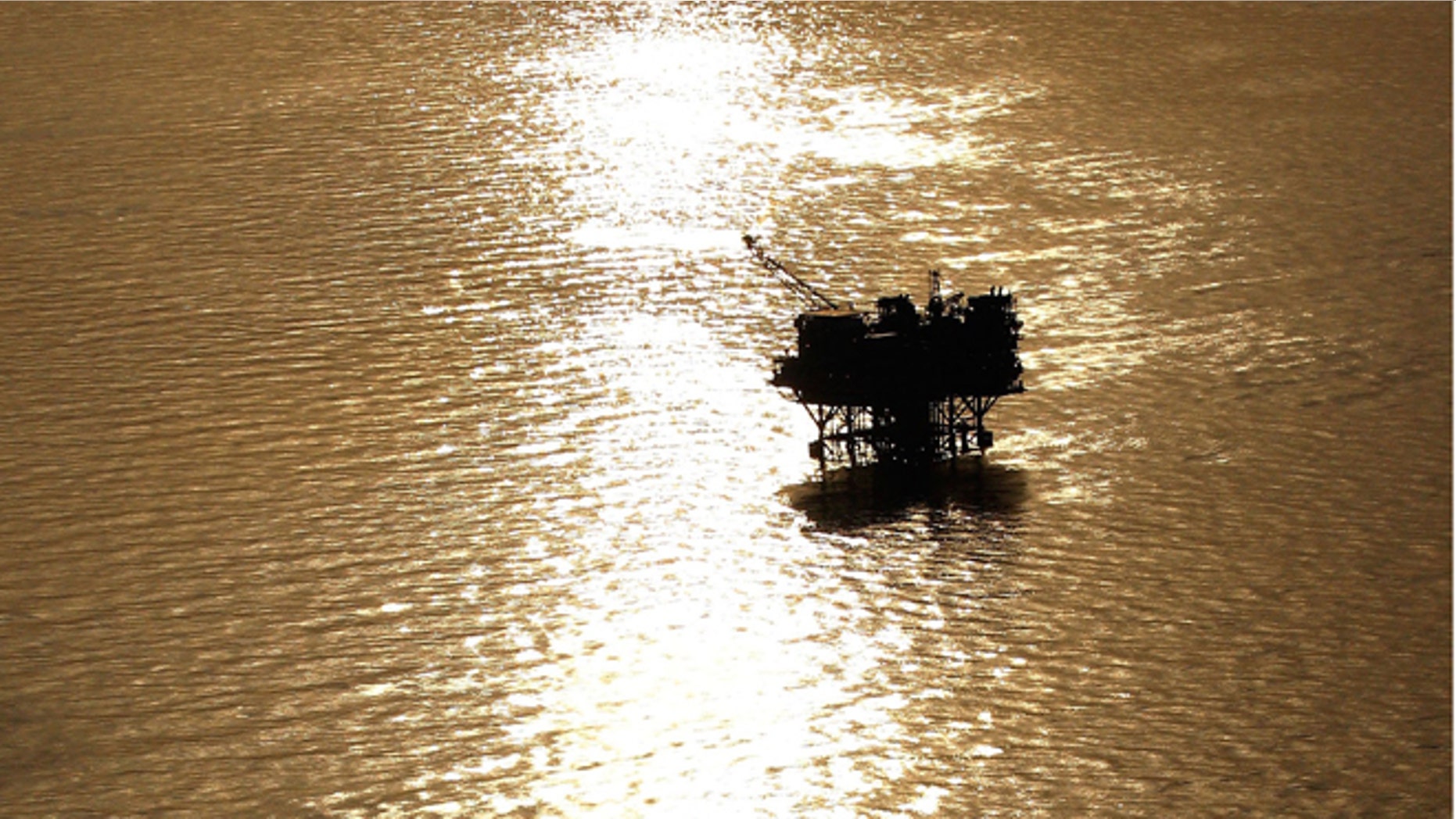 NEW ORLEANS - APRIL 28: Oil platforms sit in the Gulf of Mexico near the Louisiana coast line on April 28, 2010. (Photo by Chris Graythen/Getty Images)