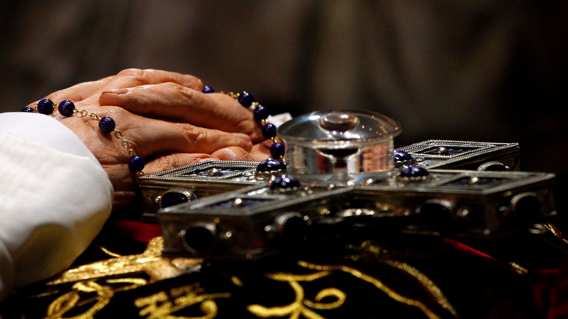 Aug. 25: A glass case containing a wax figure of Pope John Paul II with relics and a vial of the ex-pontiff's blood at the Basilica of Guadalupe in Mexico City.