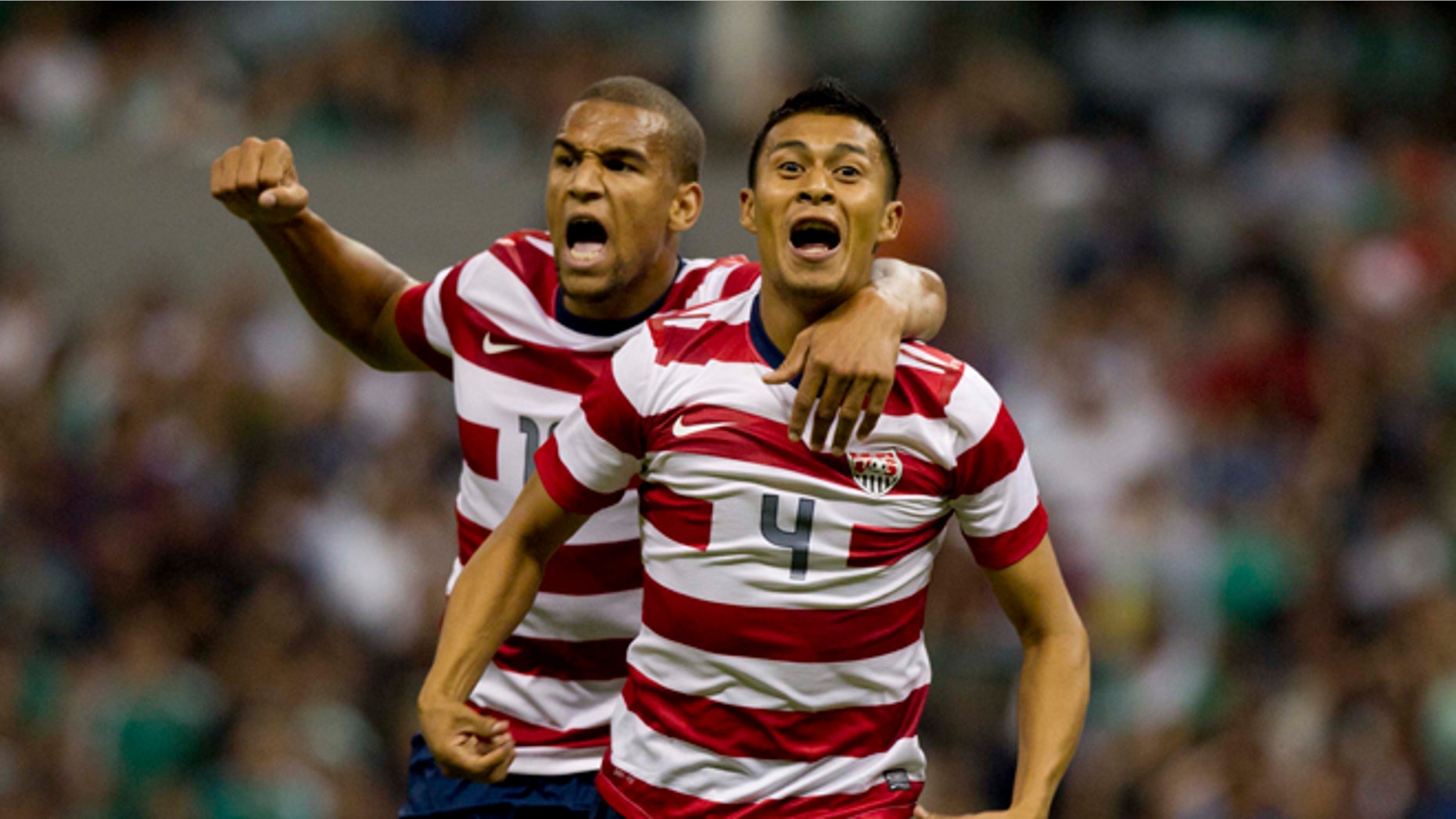 U.S Michael Orozco, right, celebrates with teammate Terrence Boyd after scoring after scoring during a friendly soccer game against Mexico in Mexico City, Wednesday, Aug. 15, 2012. (AP Photo/Eduardo Verdugo)