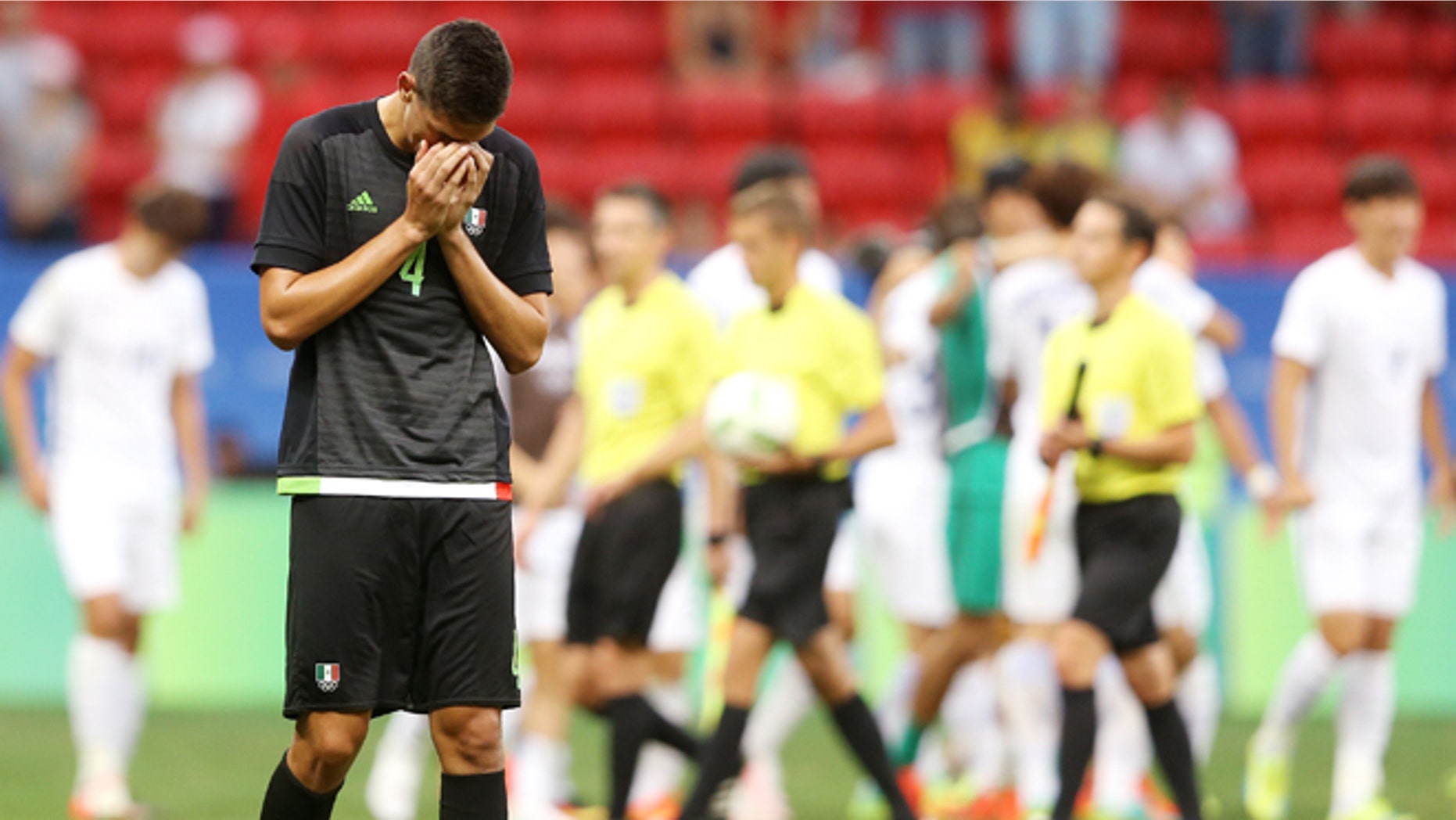 Montes Cesar laments the loss of Mexico to South Korea on August 10, 2016 in Brasilia, Brazil.