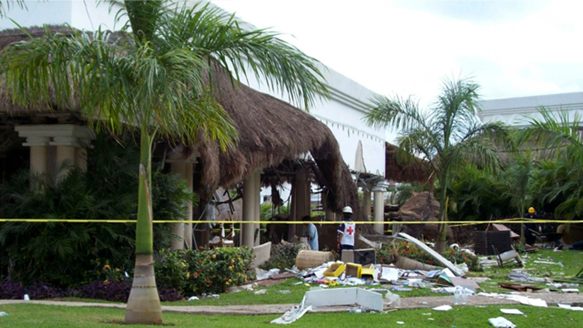 Nov. 14, 2010: Red Cross volunteer watches to the inside of the Grand Riviera Princess Hotel in Playa del Carmen, Quintana Roo state, Mexico.