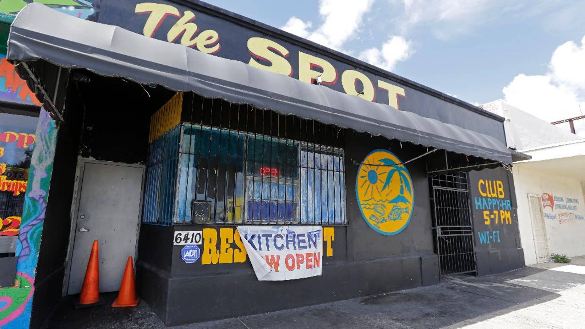 The Spot, a club in Miami, Fla., where at least 15 people were wounded in a shooting early Sunday, Sept. 28, 2014, police said. Miami police said gunfire erupted around 1 a.m. Sunday at the club. It’s unclear how many shooters there were and what caused the shooting. (AP Photo/Alan Diaz)