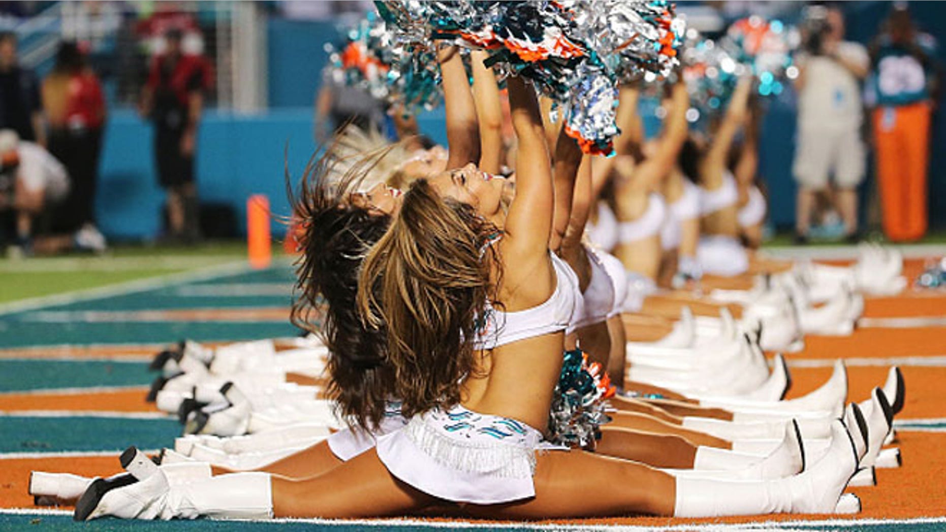 MIAMI GARDENS, FL - DECEMBER 14: Miami Dolphins cheerleaders perform during the second half of the game against the New York Giants at Sun Life Stadium on December 14, 2015 in Miami Gardens, Florida. (Photo by Mike Ehrmann/Getty Images)