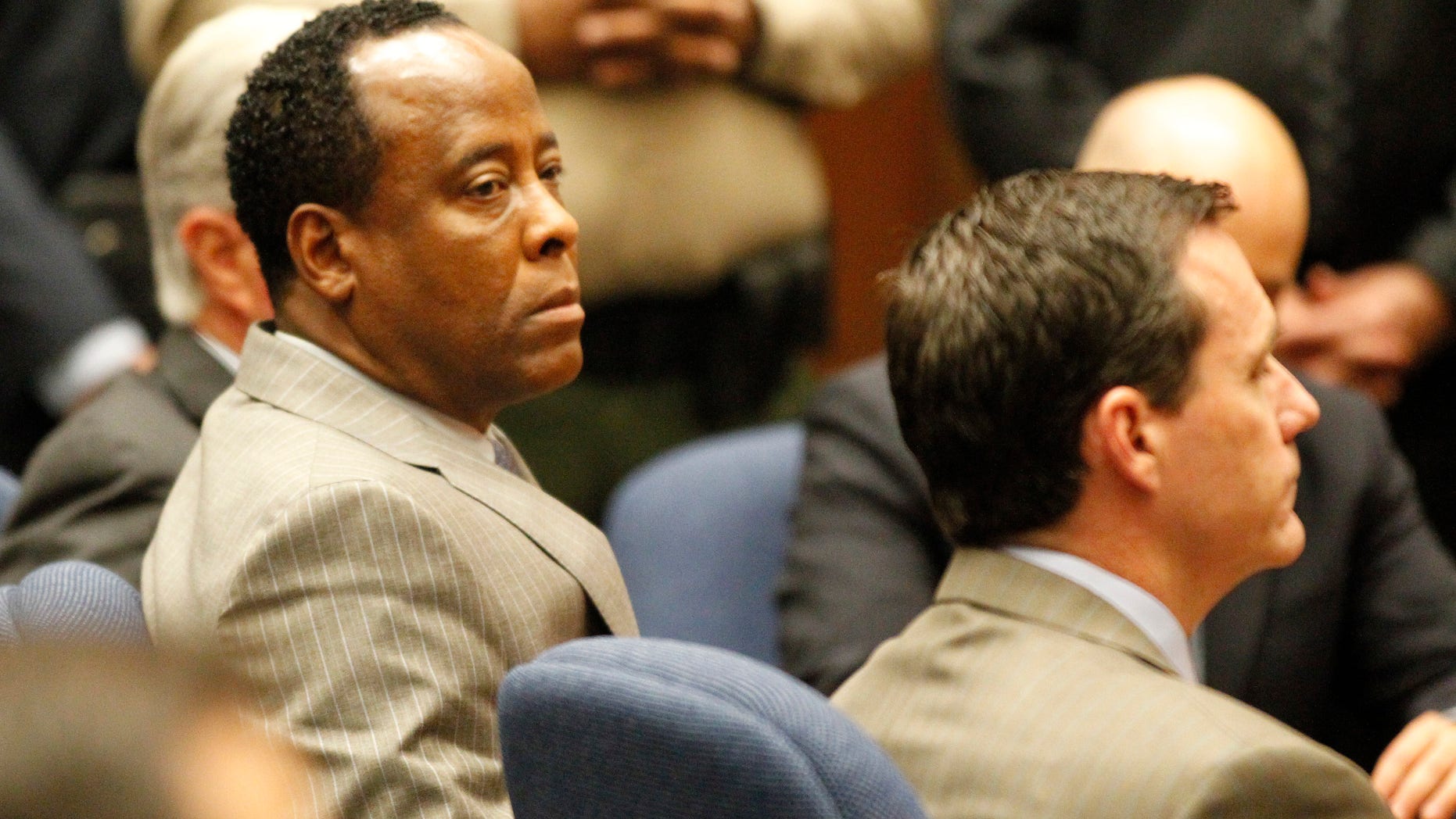 Nov. 7, 2011: Dr. Conrad Murray listens as the jury returns with a guilty verdict in his involuntary manslaughter trial in a Los Angeles courtroom .