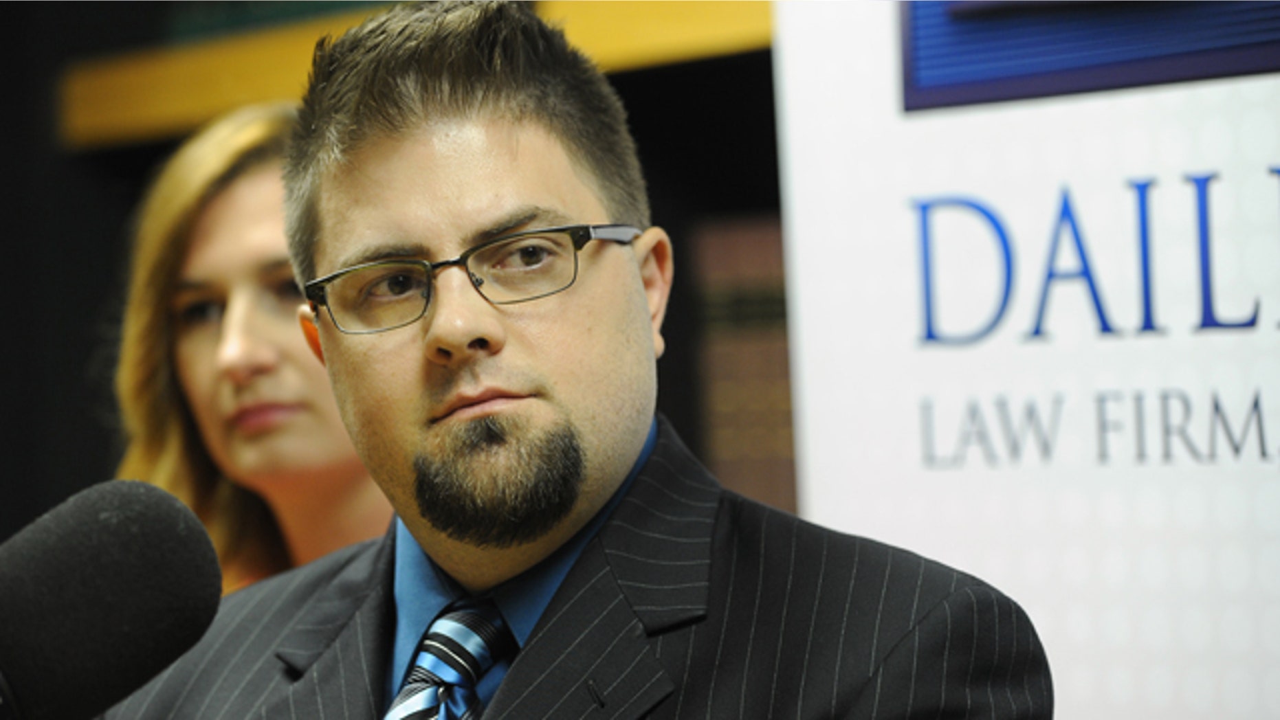 Aug. 17, 2015: Joshua Cline, former aide to Michigan state Reps. Todd Courser and Cindy Gamrat, talks about the scandal engulfing them during a news conference at Dailey Law Firm , P.C. in Royal Oak, Mich. (Brandy Baker / The Detroit News via AP)