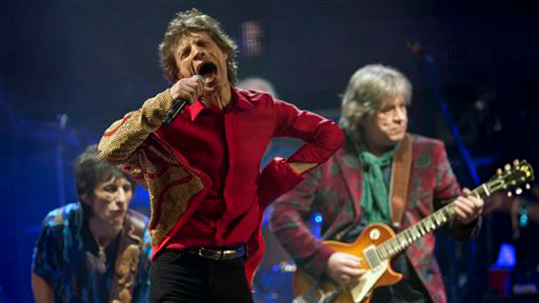 FILE - In this June 29, 2013 file photo Mick Jagger, center, Ronnie Wood, left, and Mick Taylor, of British rock band The Rolling Stones, perform on the Pyramid main stage at Glastonbury, England. The Rolling Stones on Tuesday, Nov. 19, 2013 announced theyâll be playing a gig March 22, 2014 at the Adelaide Oval in Australia. The band hasnât played the country since 2006. A news release says former member Taylor will be a special guest for the concert. (Photo by Joel Ryan/Invision/AP, File)