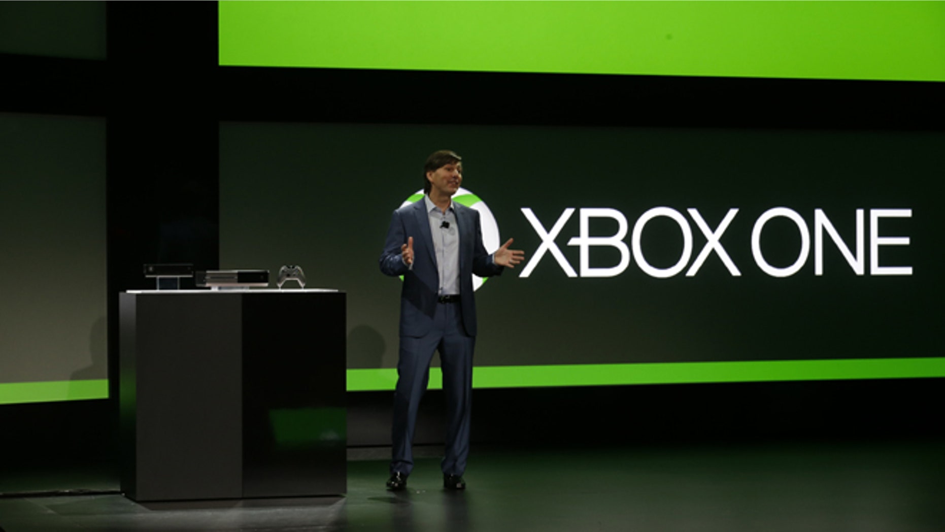File photo - May 21, 2013: Microsoft's Don Mattrick unveils the next-generation Xbox entertainment and gaming console system at an event in Redmond, Wash. It's been eight years since the launch of the Xbox 360. (AP Photo/Ted S. Warren)