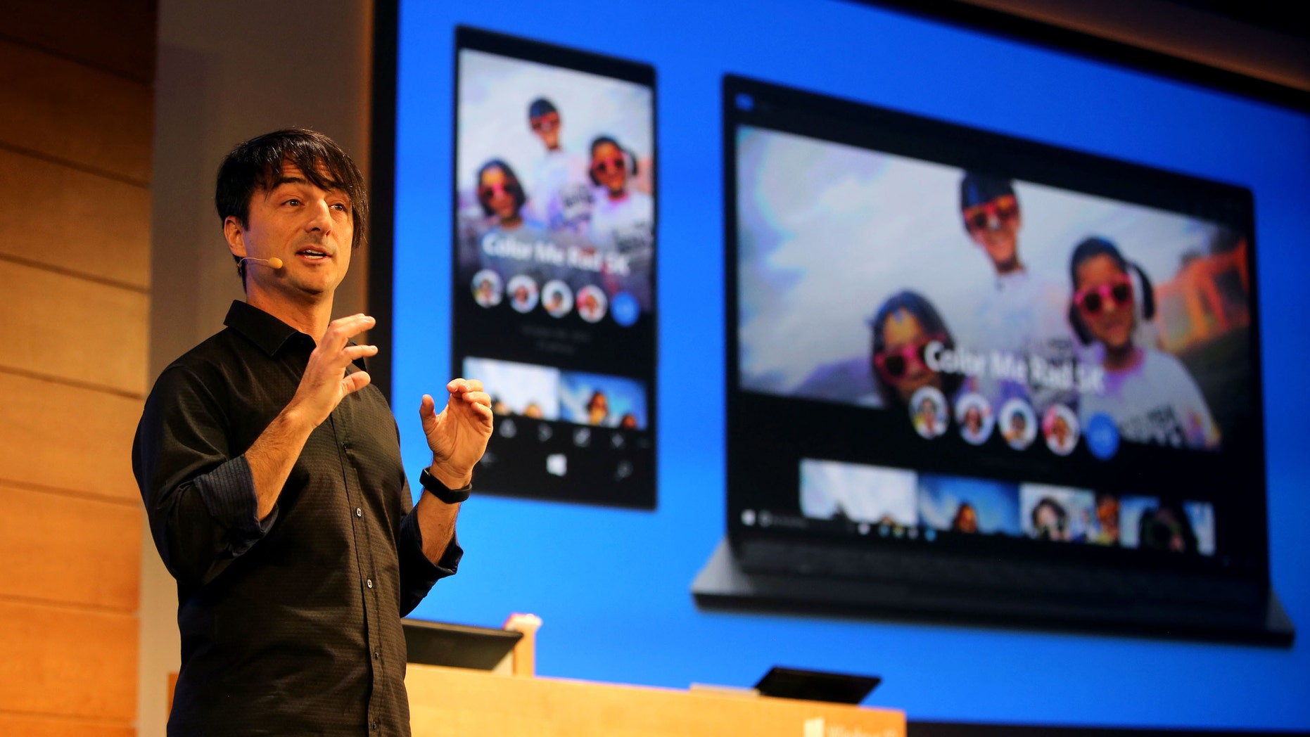 Joe Belfiore, Microsoft corporate vice president, Operating Systems Group, showcases the new Photos app for Windows 10 on Wednesday, Jan. 21, 2015.