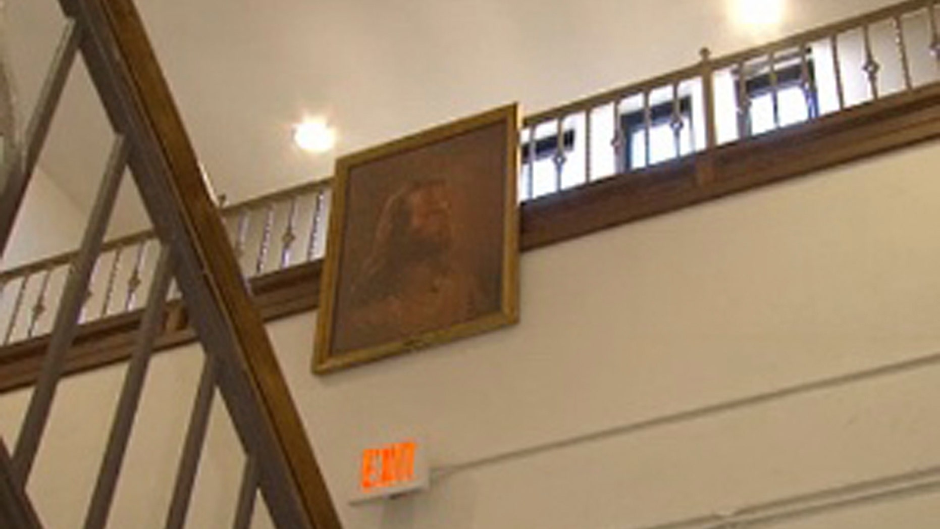 Feb. 7, 2013: Photo of a portrait of Jesus hangs in the hallway at Jackson Middle School in Jackson, Ohio.