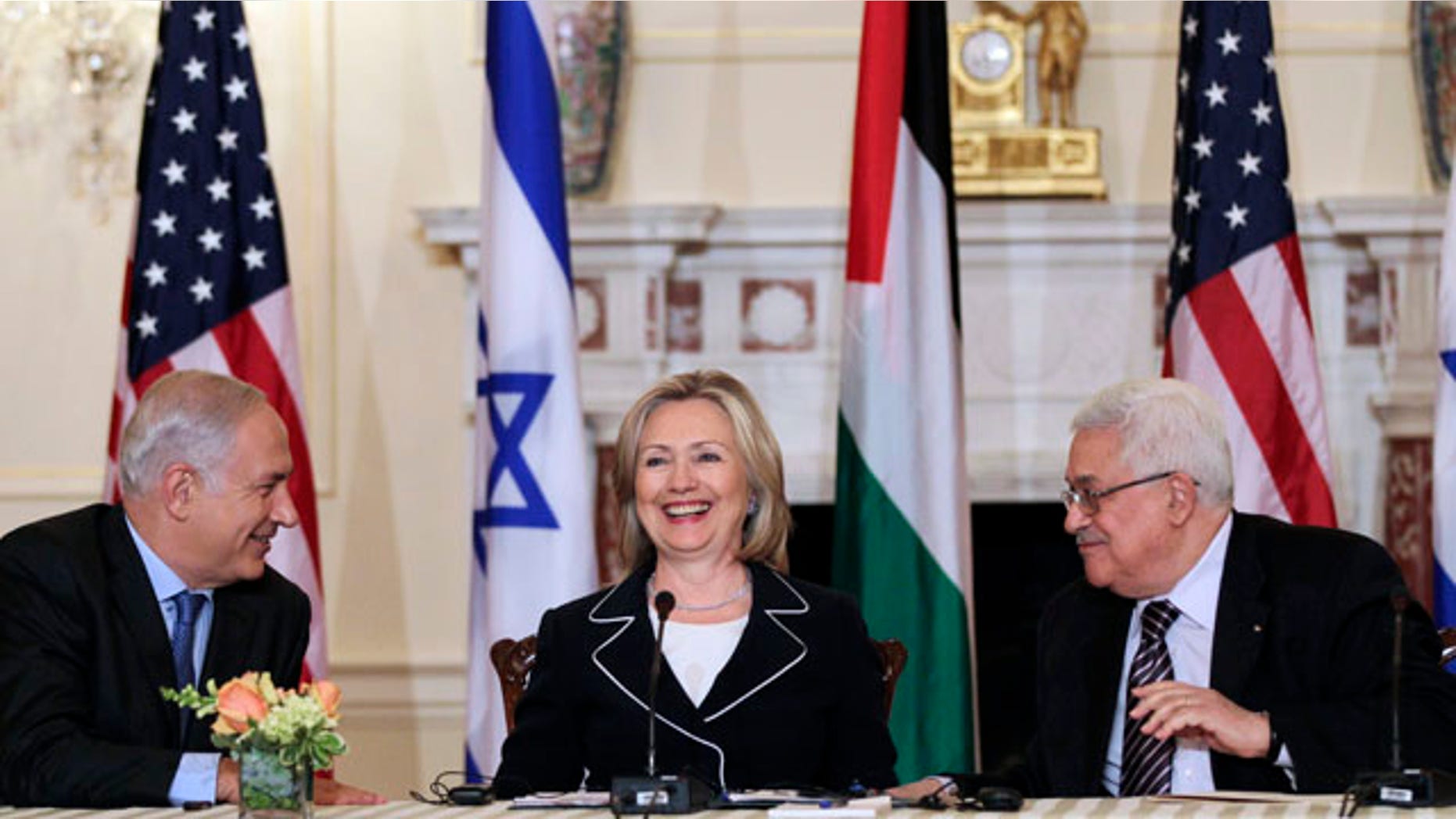 September 2: Israeli Prime Minister Benjamin Netanyahu, and Palestinian President Mahmoud Abbas, smile after an opening session of face-to-face peace talks hosted by Secretary of State Hillary Rodham Clinton at the State Department in Washington. (AP)