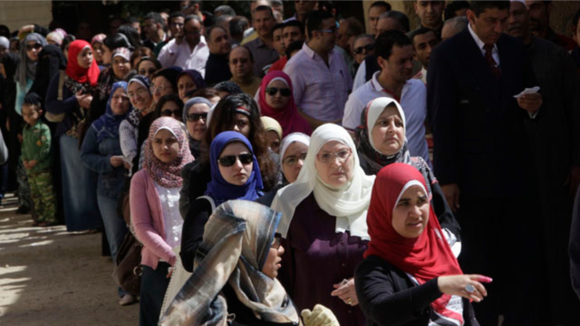 March 19, 2011: Hundreds of Egyptians line out a polling station in Cairo, Egypt as they prepare to vote on a referendum on constitutional amendments.