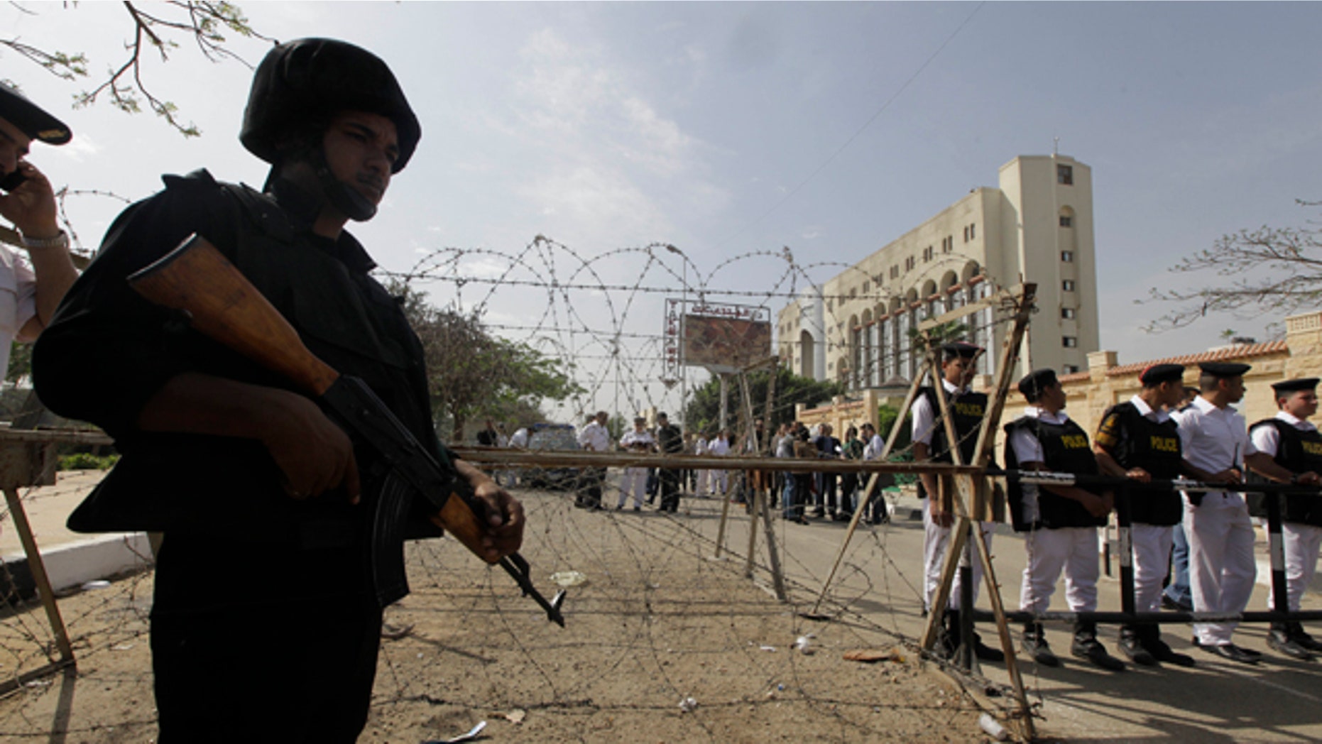 April 19, 2014: Egyptian soldiers stand guard outside the election commission office in Cairo. (AP Photo/Amr Nabil)