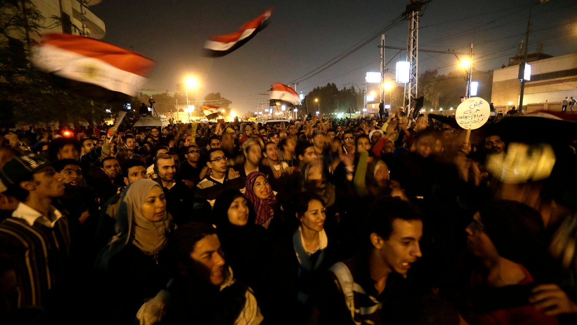 Dec. 6, 2012 - Egyptian protesters chant anti Muslim Brotherhood and Egyptian President Morsi slogans outside the presidential palace in Cairo, Egypt.