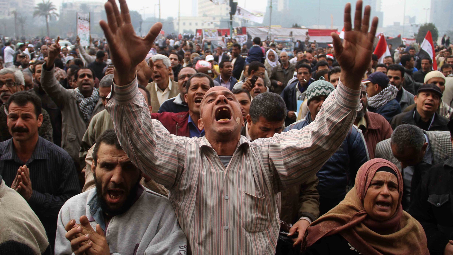 Dec. 30: Protesters chant slogans during a demonstration in Tahrir Square in Cairo, Egypt.