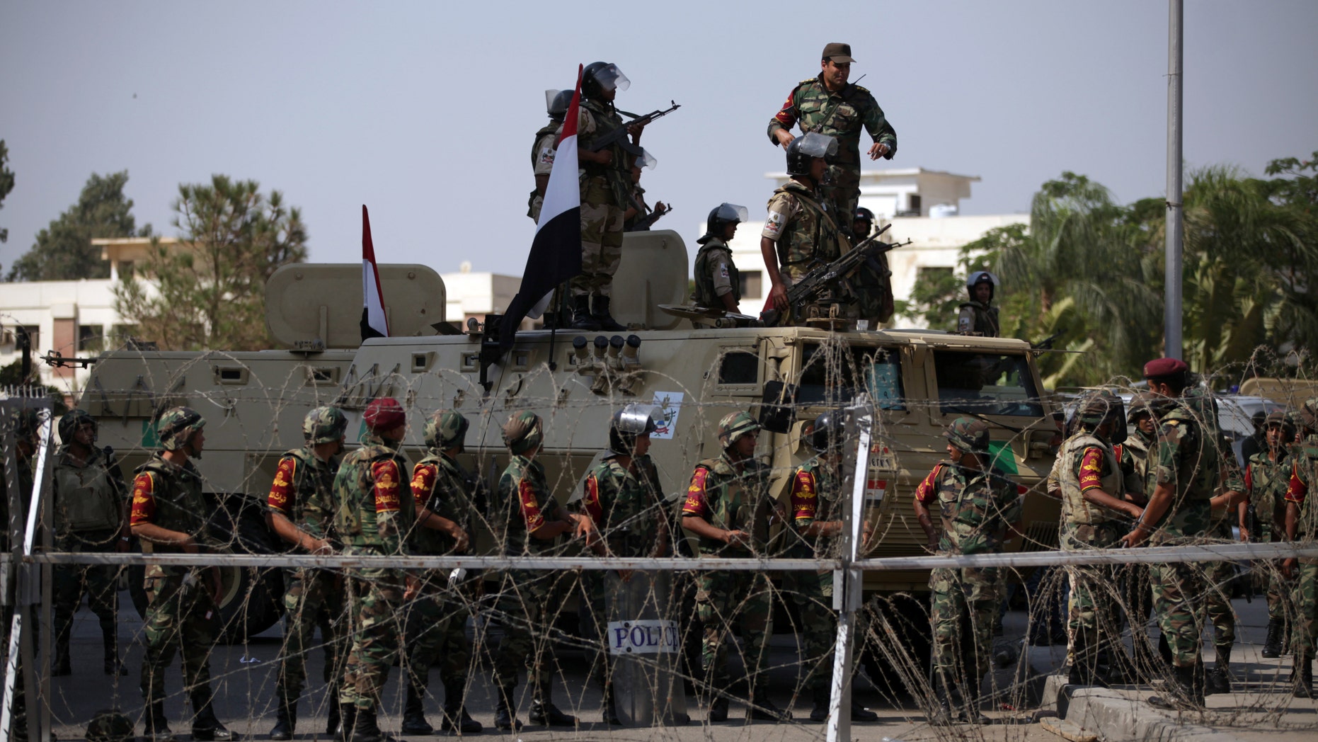 July 5, 2013 - Egyptian soldiers stand guard outside the Republican Guard building in Cairo, Egypt.