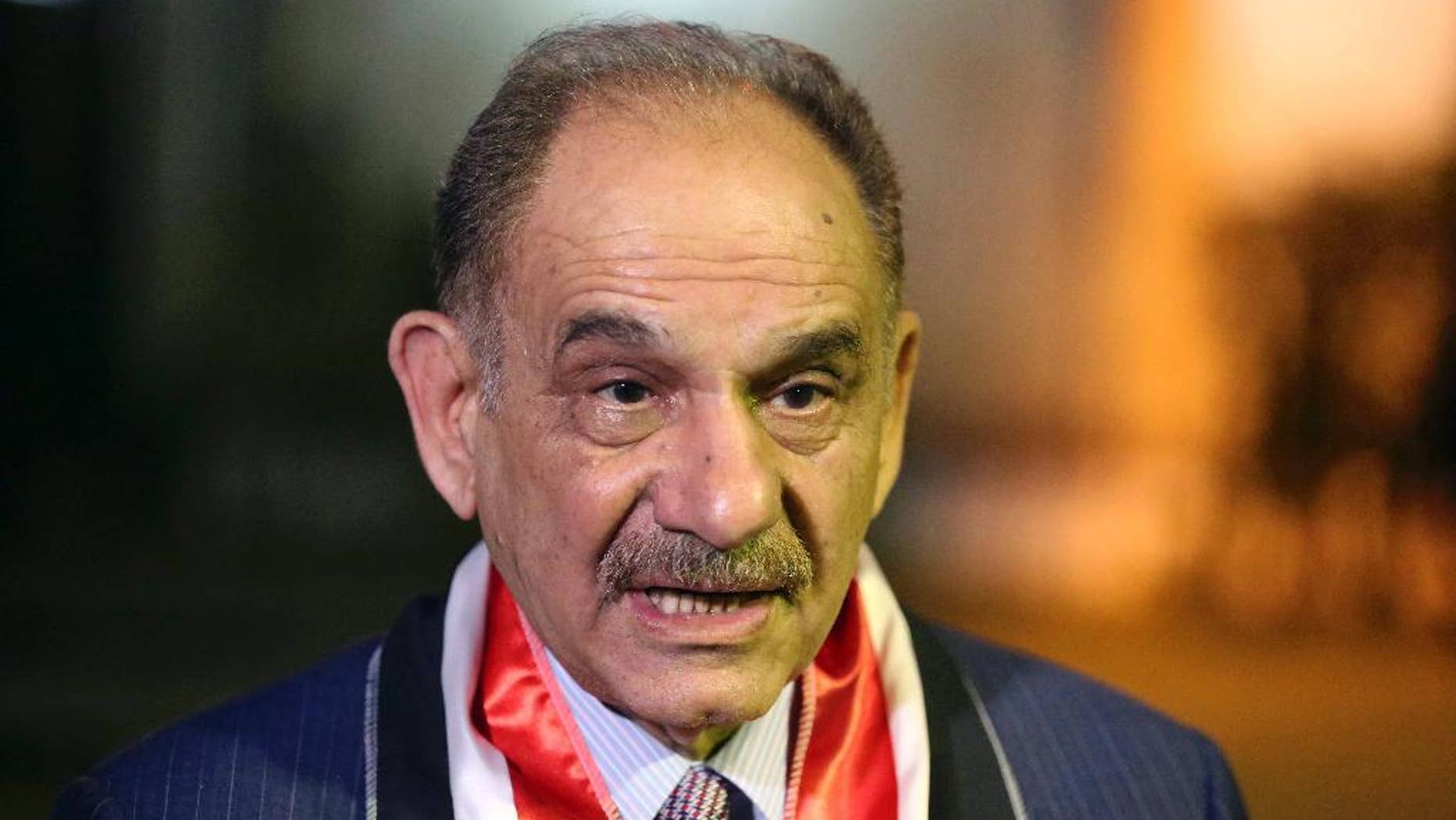 FILE- In this April 26, 2014 file photo, Iraqi Deputy Prime Minister Saleh al-Mutlaq talks with The Associated Press in Baghdad, Iraq. On Monday, Feb. 9, 2015, al-Mutlaq told The Associated Press on the sidelines of a conference in Dubai, that the U.S.-led coalition helping Iraq push back Islamic State group militants is not doing enough to match the scale of the threat, and he called for increased firepower to defeat the extremists. (AP Photo/Karim Kadim, File)