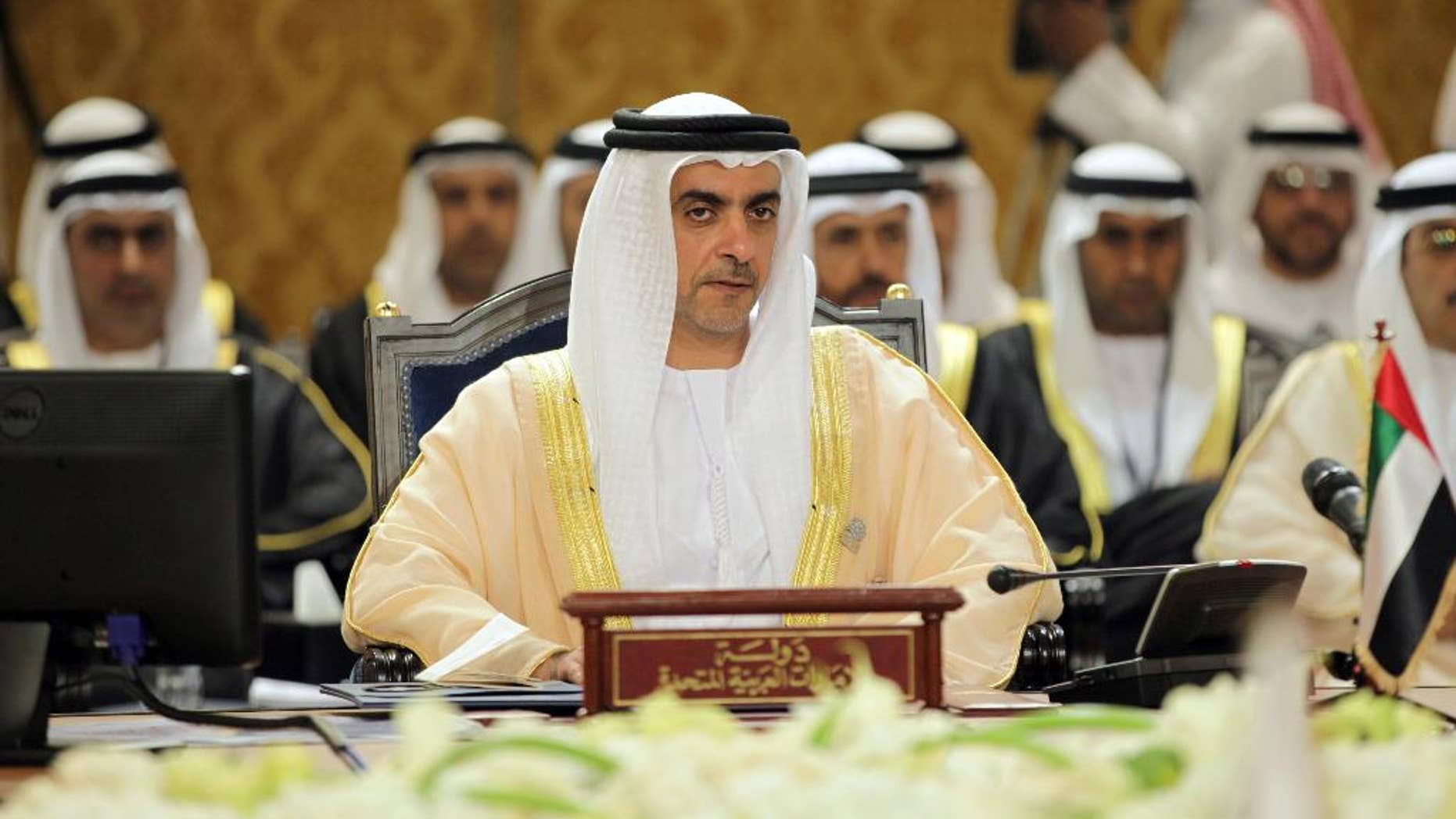 FILE - In this Thursday, Nov. 28, 2013 file photo, Emerati Interior Minister Sheik Saif bin Zayed Al Nahyan, center, participates in a Gulf Cooperation Council interior ministers gathering to discuss regional security issues in Manama, Bahrain. Omar al-Sinki, interior minister of Libya told The Associated Press ahead of his meeting Monday, Dec. 1, 2014 with Al Nahyan that he wants greater technical, logistical and political support from Arab and international allies. He declined to discuss details of whether members of the armed forces have received military equipment and arms from the UAE. (AP Photo/Hasan Jamali, File)