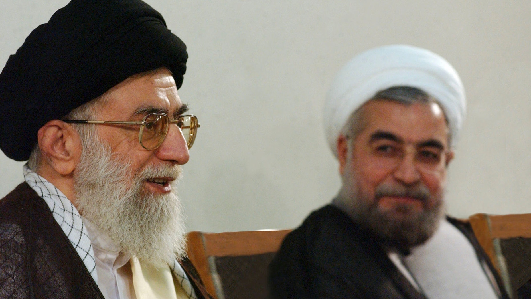 June 16, 2013 - Photo released by the official website of the Iranian supreme leader's office, supreme leader Ayatollah Ali Khamenei, left, speaks during his meeting with President-elect Hasan Rowhani in Tehran, Iran.