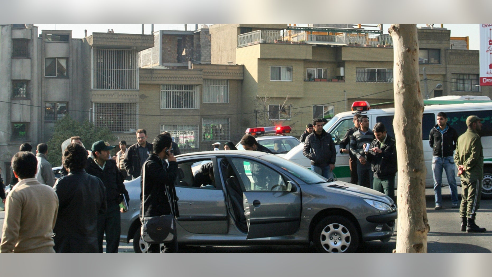Nov. 29: This photo released by Fars News Agency is claimed by them to show one of the damaged cars following bomb attacks on the vehicles of two nuclear scientists in Tehran, Iran. State television reported assailants on motorcycles attached bombs to the two cars of two nuclear scientists as they were driving to work in Tehran, killing one and seriously wounding the other.