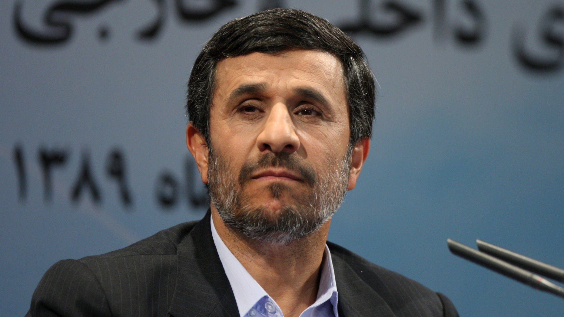 Iranian president Mahmoud Ahmadinejad shown here Nov. 29, listens to a question during his press conference in Tehran, Iran. Ahmadinejad was jeered when he said in a speech at Colombia University that homosexuality did not exist in Iran.