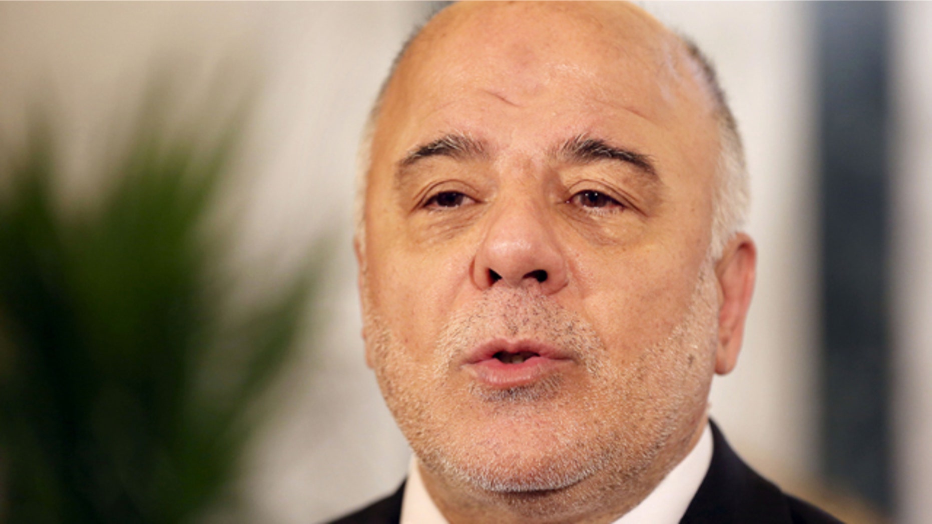 Jan. 21, 2015: Iraq's Prime Minister Haider al-Abadi speaks during an interview with The Associated Press in Baghdad. Al-Abadi called on the international community to do more to help his country win the war against the Islamic State group, saying that the help pledged by a dozen countries has thus far fallen short. (AP Photo/Hadi Mizban)