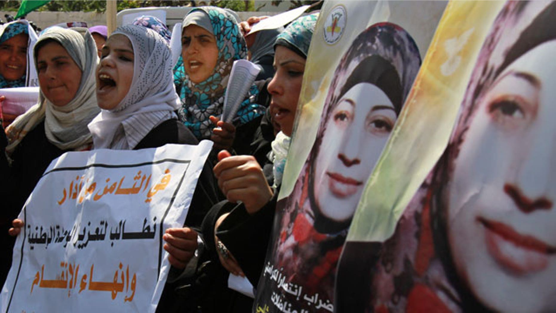 Mar. 8, 2012: Palestinian women take part in a protest in solidarity with Hana Shalabi, a Palestinian prisoner jailed in Israel and who has been on hunger strike for 22 days, and marking International Women's Day in front of the International Red cross offices in Gaza City.