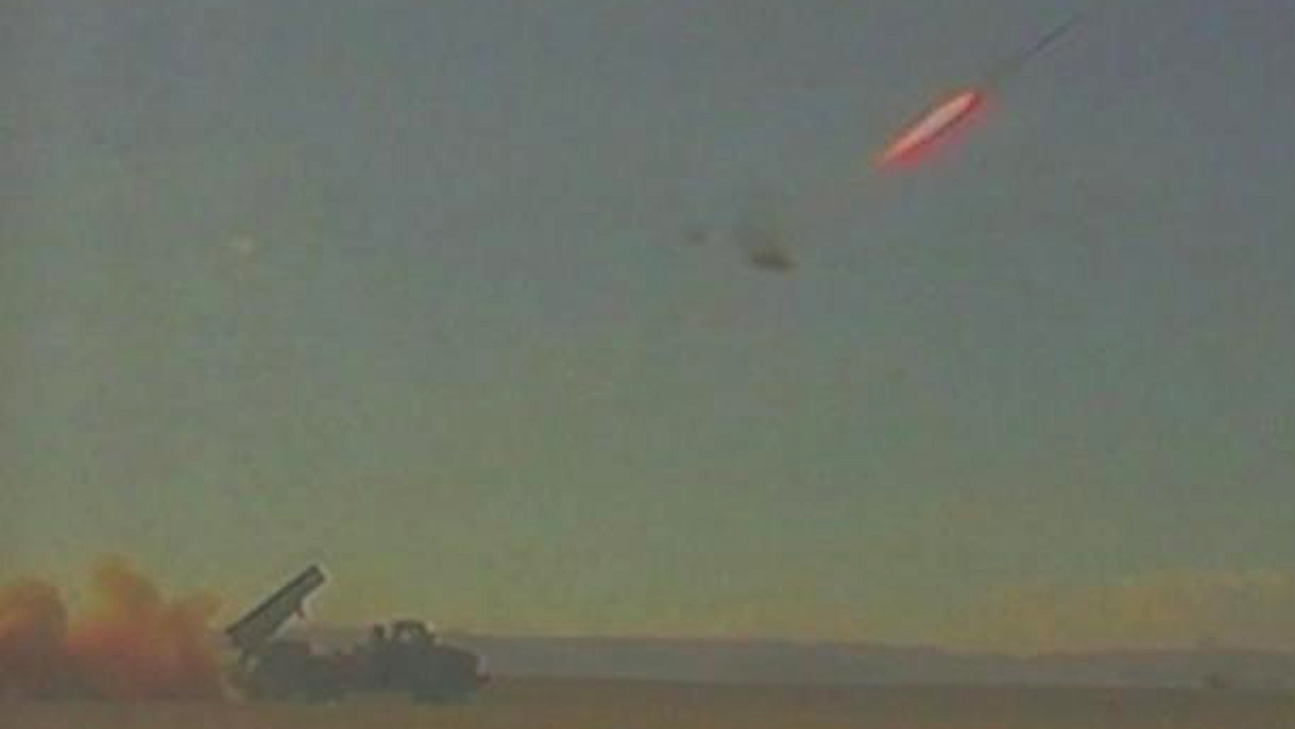 In this undated file photo provided by Israeli Defence Ministry on Jan. 6, 2010, purporting to show a rocket fired by the Iron Dome system during a test fire somewhere in southern Israel. The Iron Dome system that is reputed to be able to shoot down incoming rockets, Israeli Defense Minister Ehud Barak said he approved the deployment of the system as "an operational experiment" along the border with Gaza to protect southern Israeli communities from Palestinian attacks. Friday, March 25, 2011. (AP/Defense Ministry)