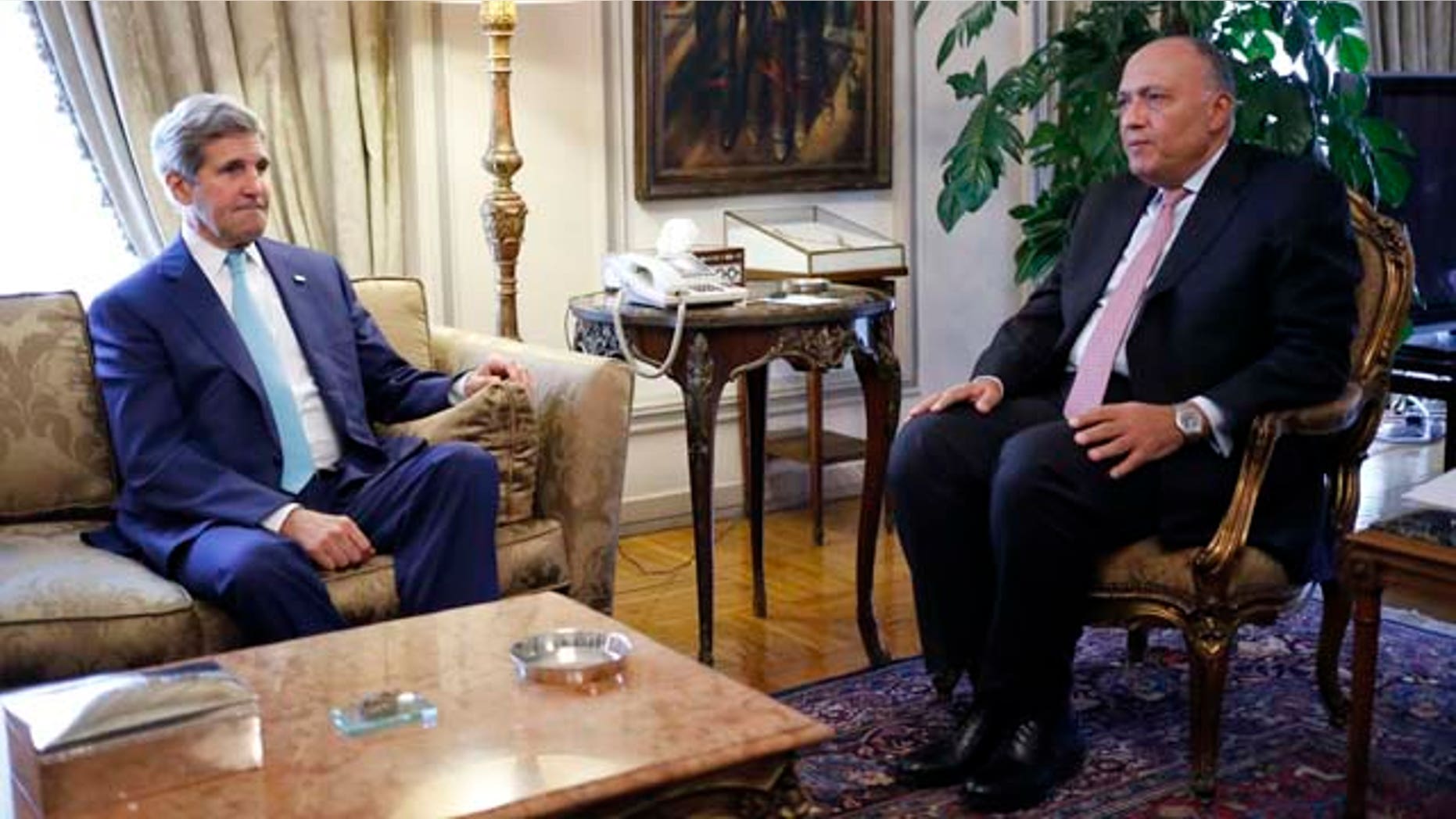 July 22, 2014: U.S. Secretary of State John Kerry meets with Egypt's Foreign Minister Sameh Shukri in Cairo.