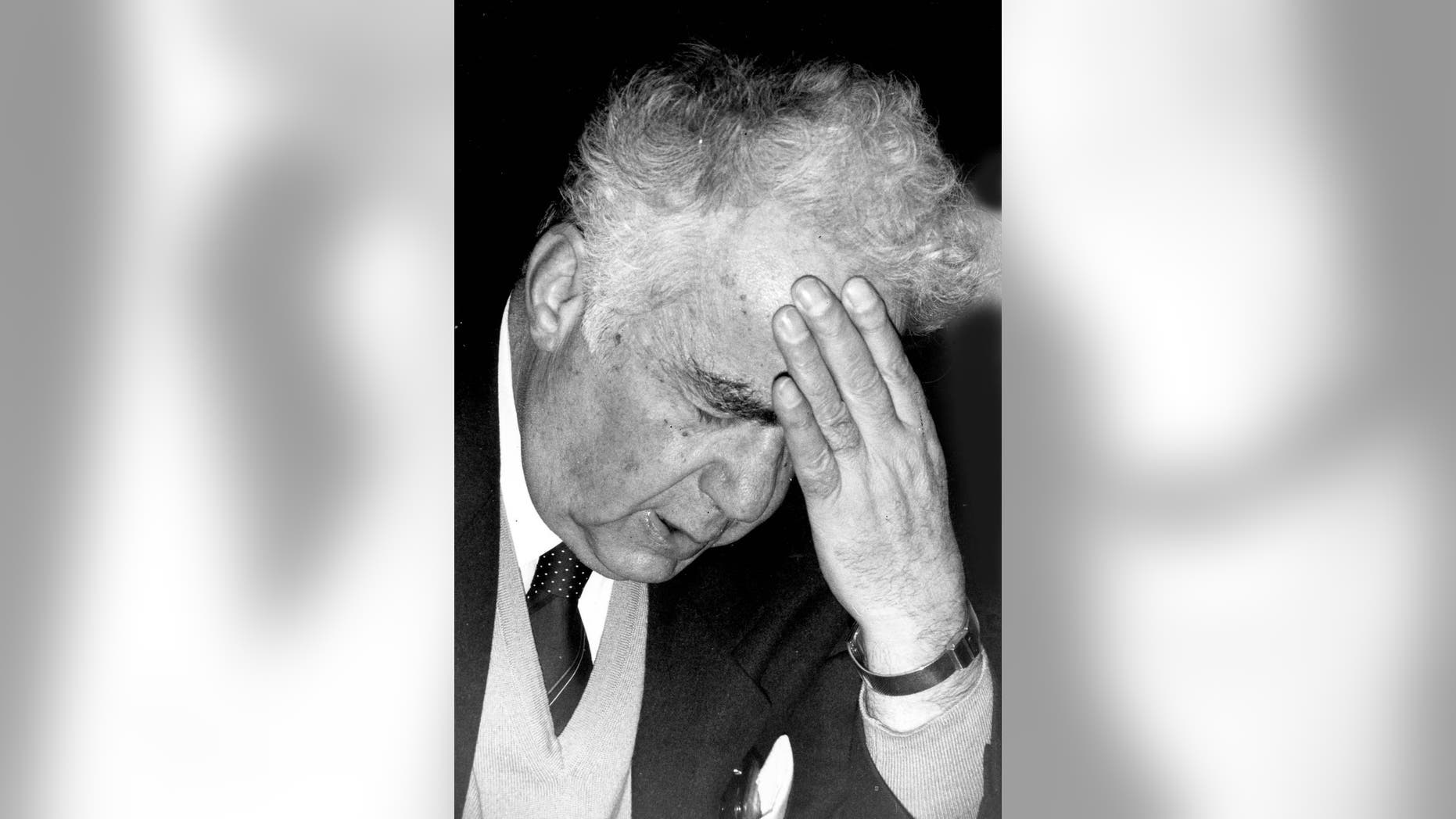 In this September, 1983 photo, Prominent Lebanese poet Saeed Akl gestures at his home, in Beirut, Lebanon. Lebanon’s state-run news agency says Saeed Akl, Lebanon’s leading poet whose fame once spread throughout the Arab world, has died. He was 102. The ultra-nationalist Akl wrote his poems in classical Arabic as well as Lebanese dialect which he used to refer to as “the Lebanese language.” (AP Photo/Stavro Jabra)