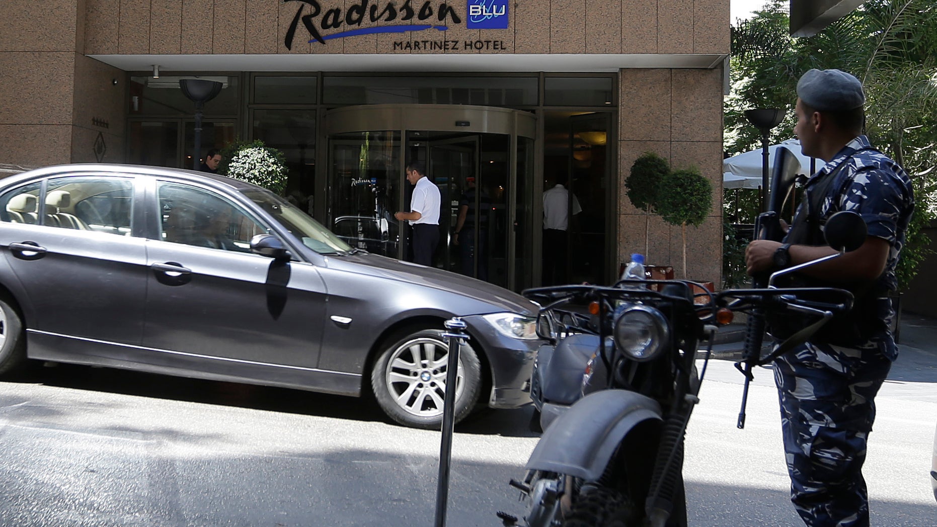 Aug. 9, 2013 - A Lebanese policeman stands guard in front of a hotel where the rest of the Turkish Airlines crew stay after six gunmen ambushed their vehicle on an old airport road and snatched two men of the Turkish crew, according to Lebanese officials, in Beirut, Lebanon.