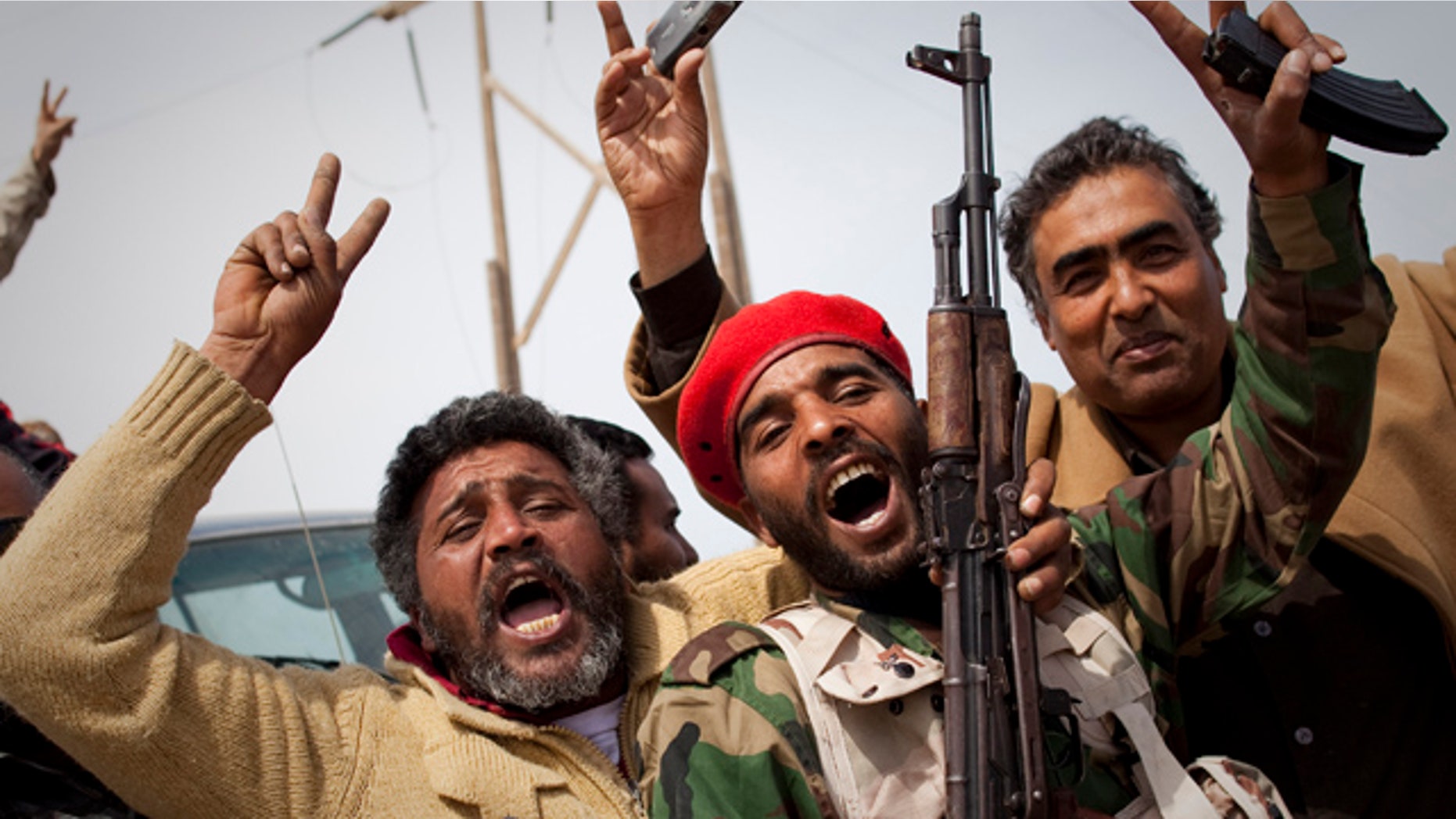 March 27, 2011: Libyan rebels jubilate on a checkpoint in Al-Egila, east of Ras Lanuf, eastern Libya.