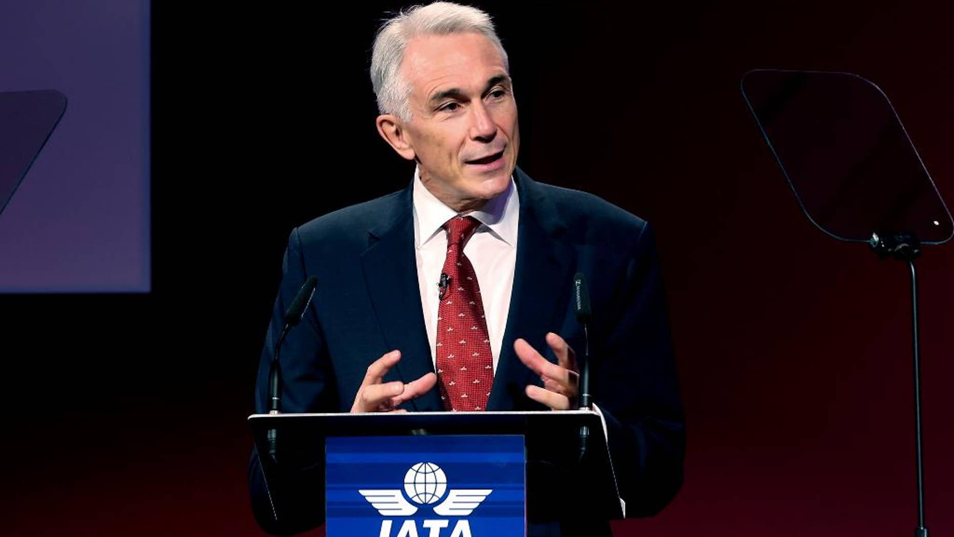 International Air Transport Association director Tony Tyler speaks during the the IATA's annual meeting held this year in Doha, Qatar, Monday, June 2, 2014. Tyler says the group will prepare a draft of new recommendations in September to improve global tracking capabilities in the aftermath of the disappearance of Malaysia Airlines Flight 370. (AP Photo/Osama Faisal)