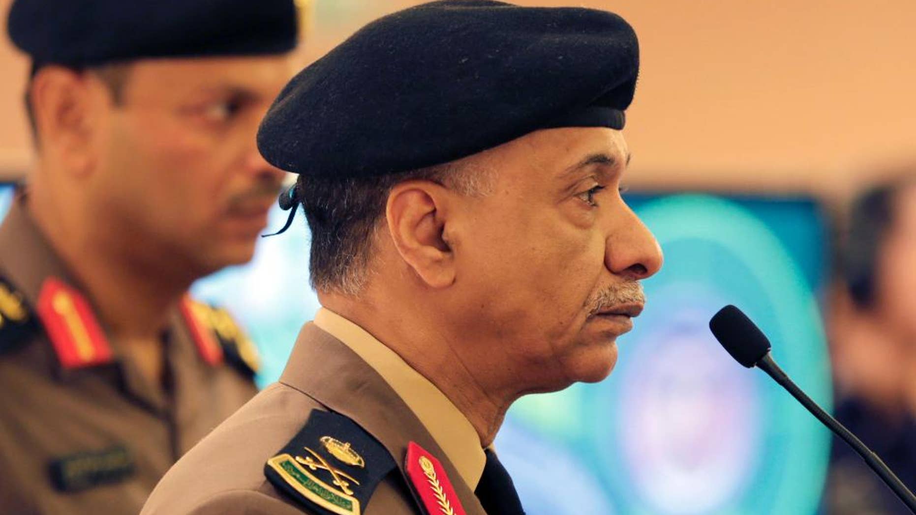 FILE - In this Friday, April 24, 2015 file photo, Saudi Interior Ministry spokesman Maj. Gen. Mansour al-Turki listens to journalists questions during a press conference in Riyadh, Saudi Arabia. Saudi Arabia said Tuesday, April 28, 2015, it has arrested a total of 93 people with ties to the Islamic State group in recent months, foiling their plans to carry out multiple terrorist attacks, including a strike on the U.S. Embassy in the kingdom's capital. Al-Turki said the arrests include a cell of 65 people arrested in March who were involved in a plan that included targeting residential compounds, prisons and security forces. (AP Photo/Hasan Jamali, File)