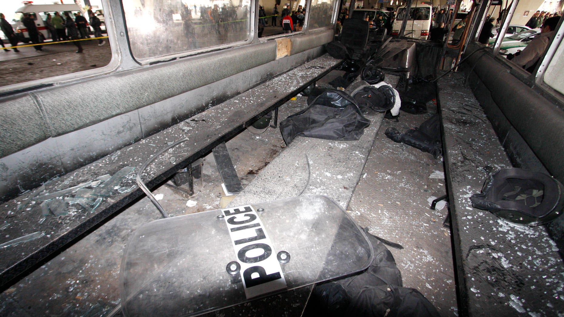 Jan. 6, 2012: Syrian riot police forces gear is seen inside a damaged bus at the scene bomb at Midan neighborhood, in Damascus, Syria.